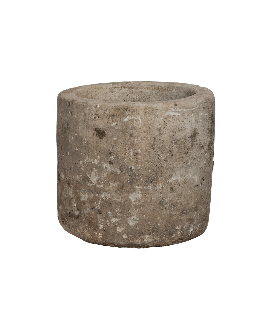 Vintage round limestone trough, rich grey, weathered surface and texture from Indonesia.
