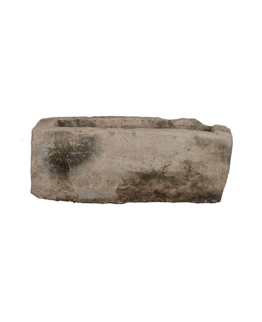 Vintage rectangular limestone trough, showing weathered texture and aged dark moss patina.