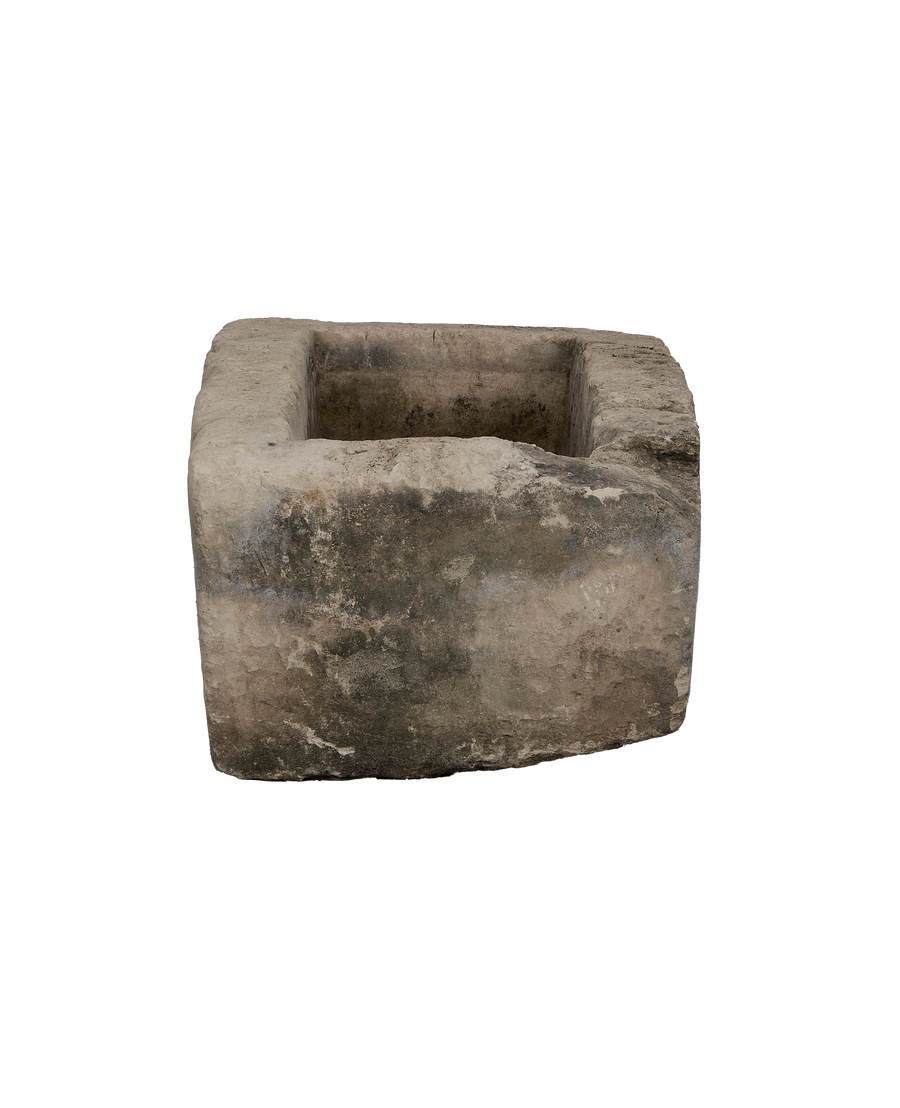 Vintage Indonesian rectangular limestone trough, detailed internal shot showing deep weathered texture and discoloration.
