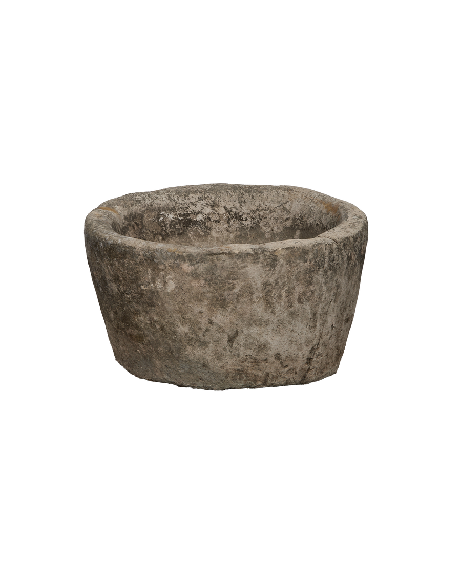 Vintage Indonesian limestone round trough from above, showing weathered texture.