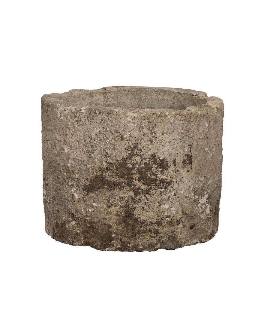 Vintage Indonesian limestone OAK trough, round, showing detailed side texture and wear.