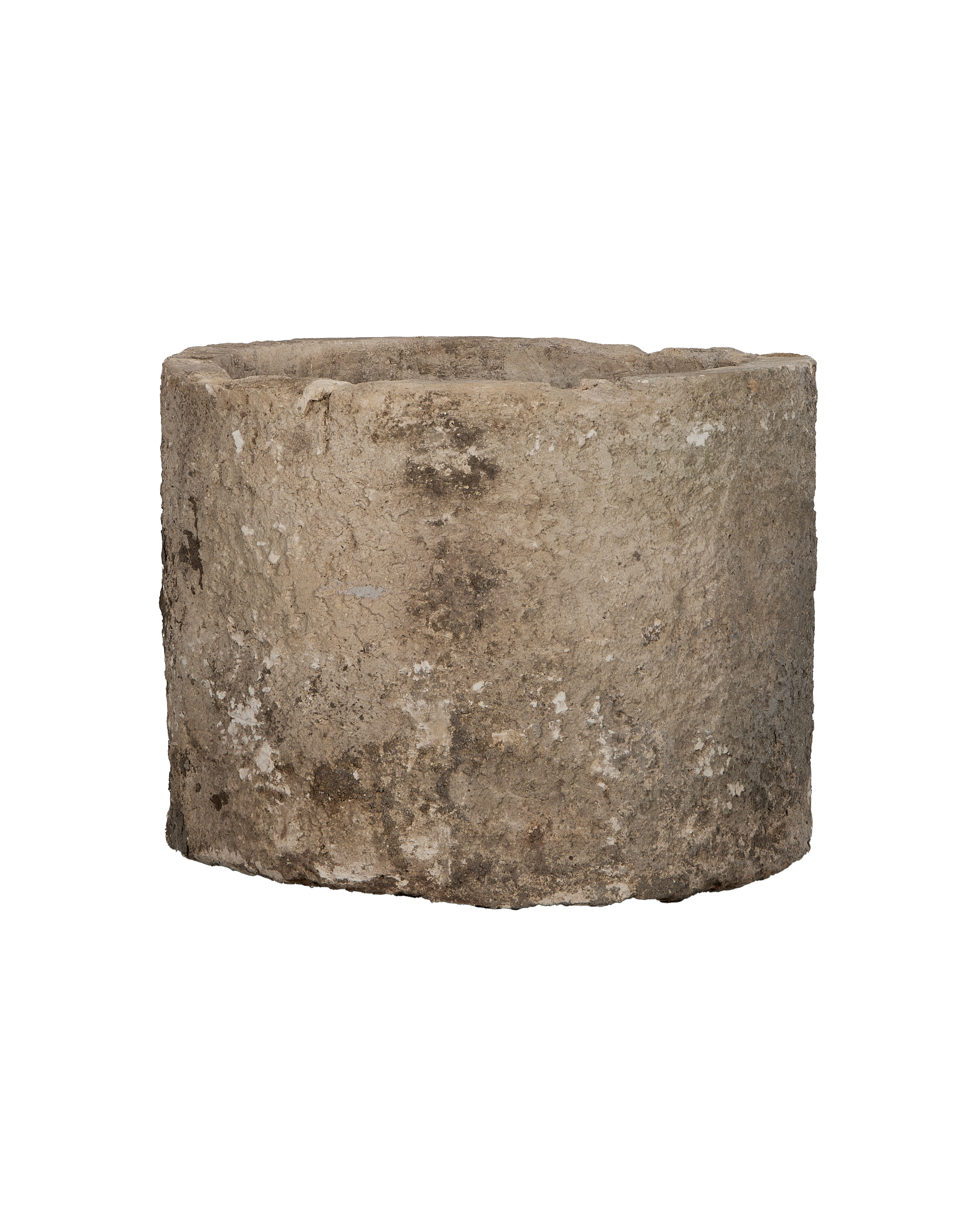 Vintage Indonesian round limestone trough, close-up of textured surface with weathered details.