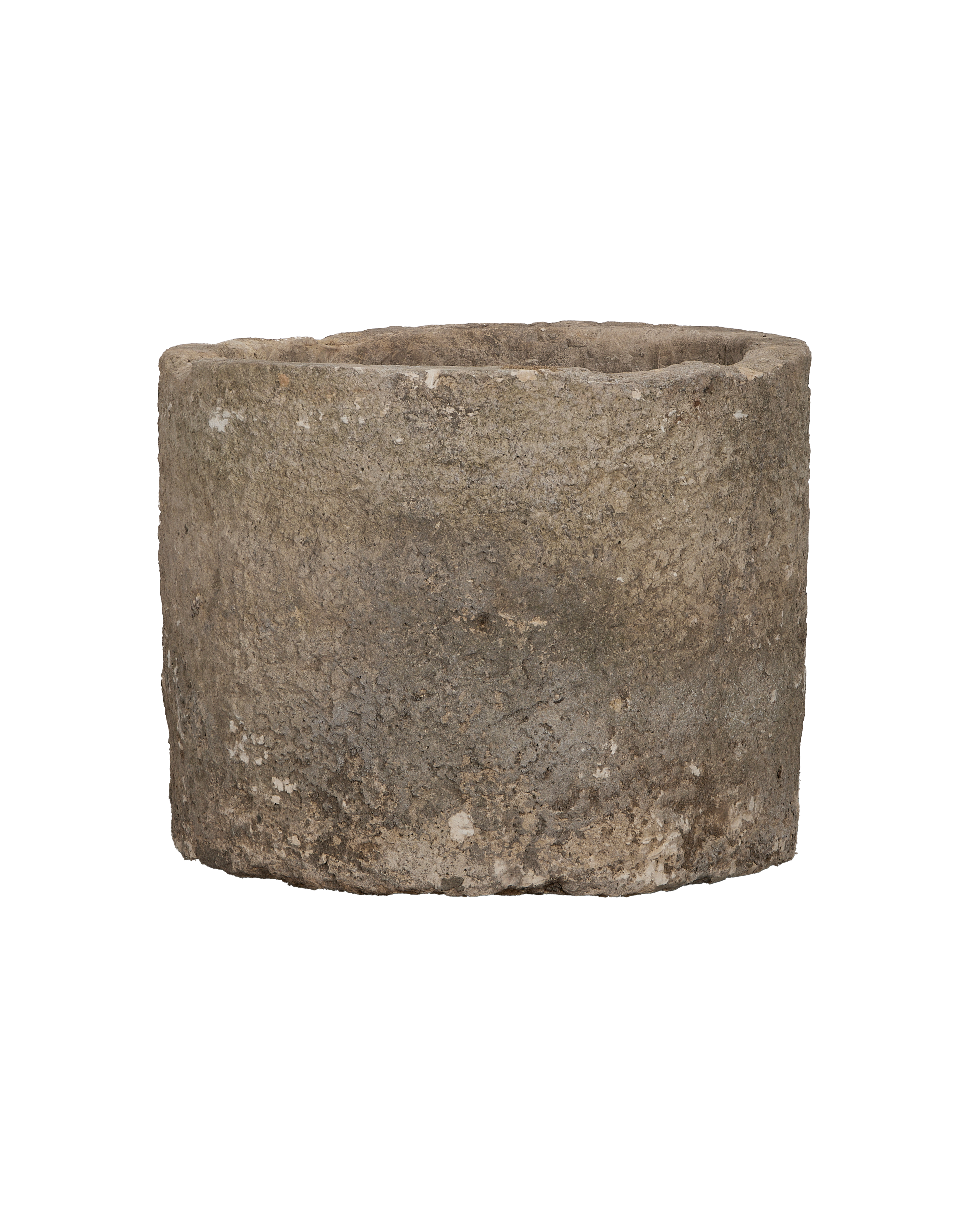 Vintage Indonesian limestone trough closeup, featuring rough texture and weathered top edge detail.