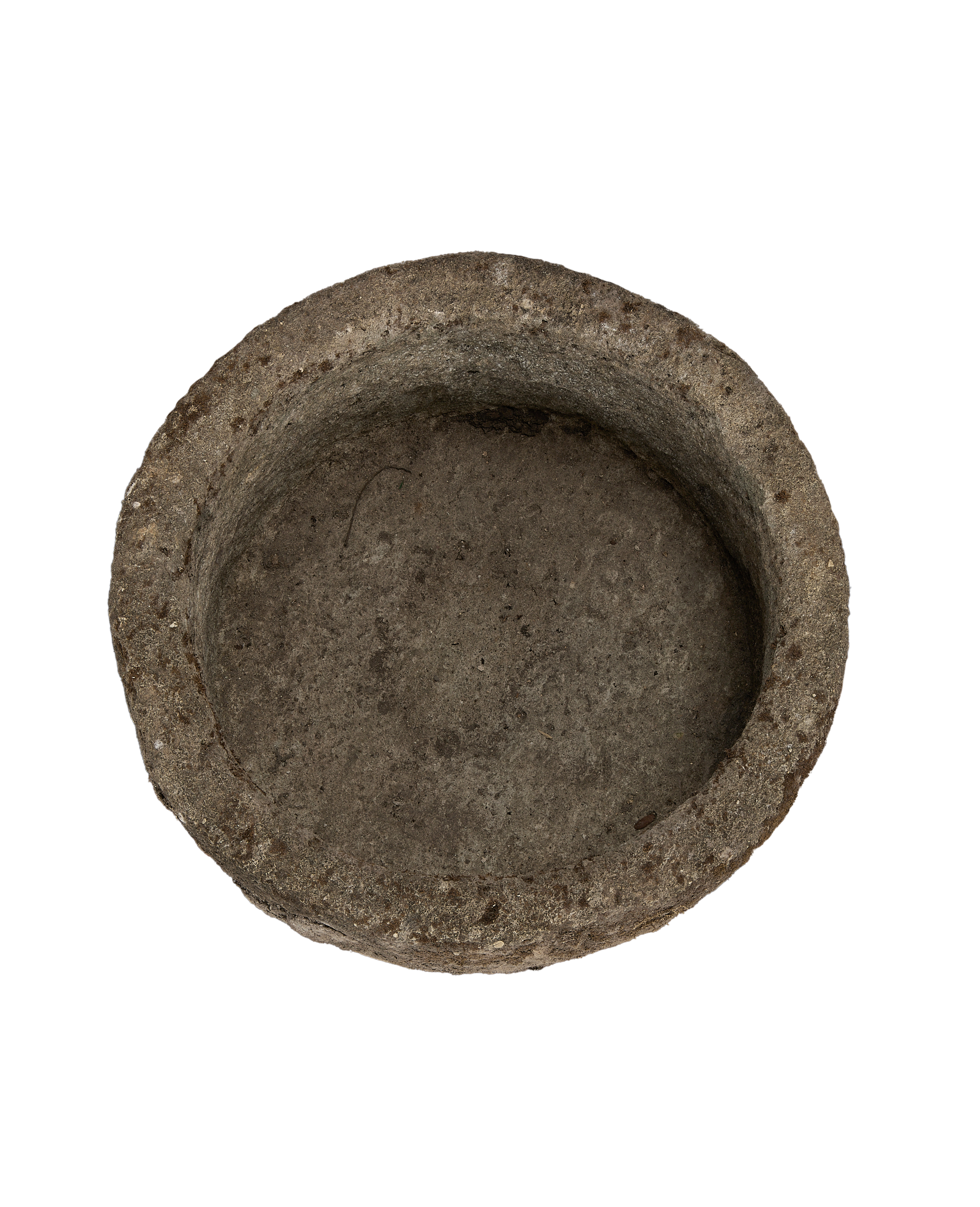 Top-down view of a vintage round limestone trough from Indonesia, weathered surface.