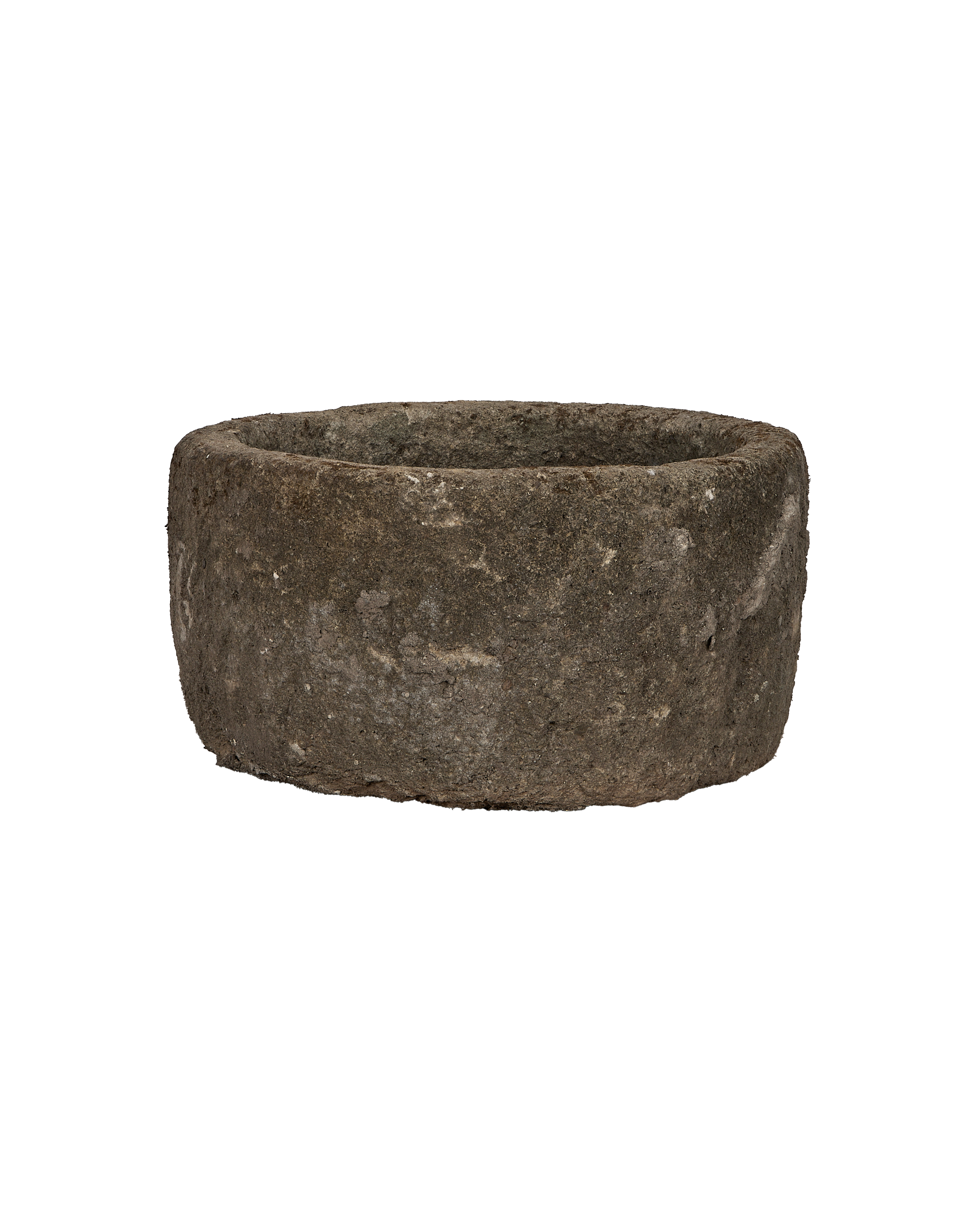 Vintage round limestone trough from Indonesia, showing rough texture and weathered finish.