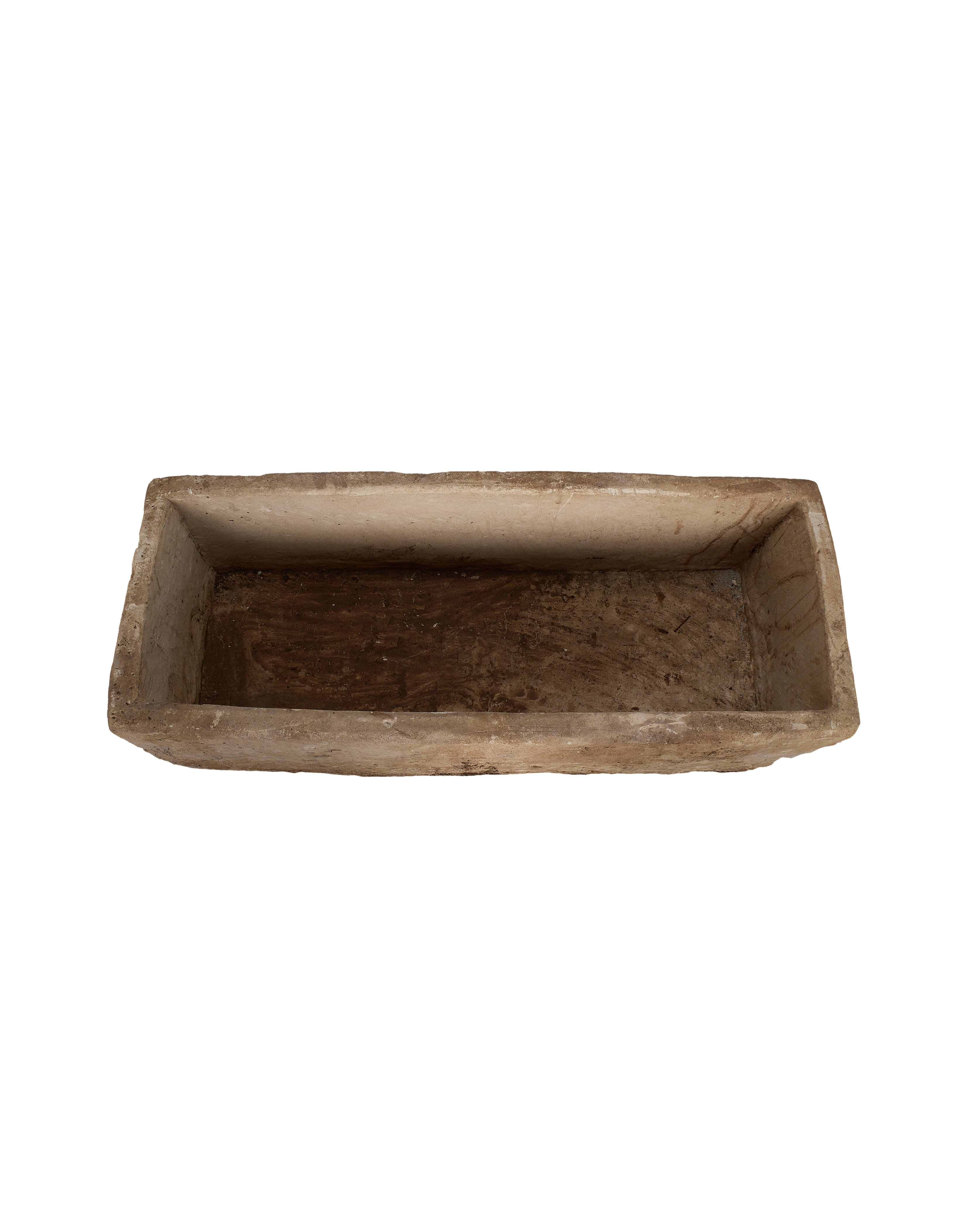 Vintage rectangular limestone trough, showing the rustic, textured interior basin and weathered rim.