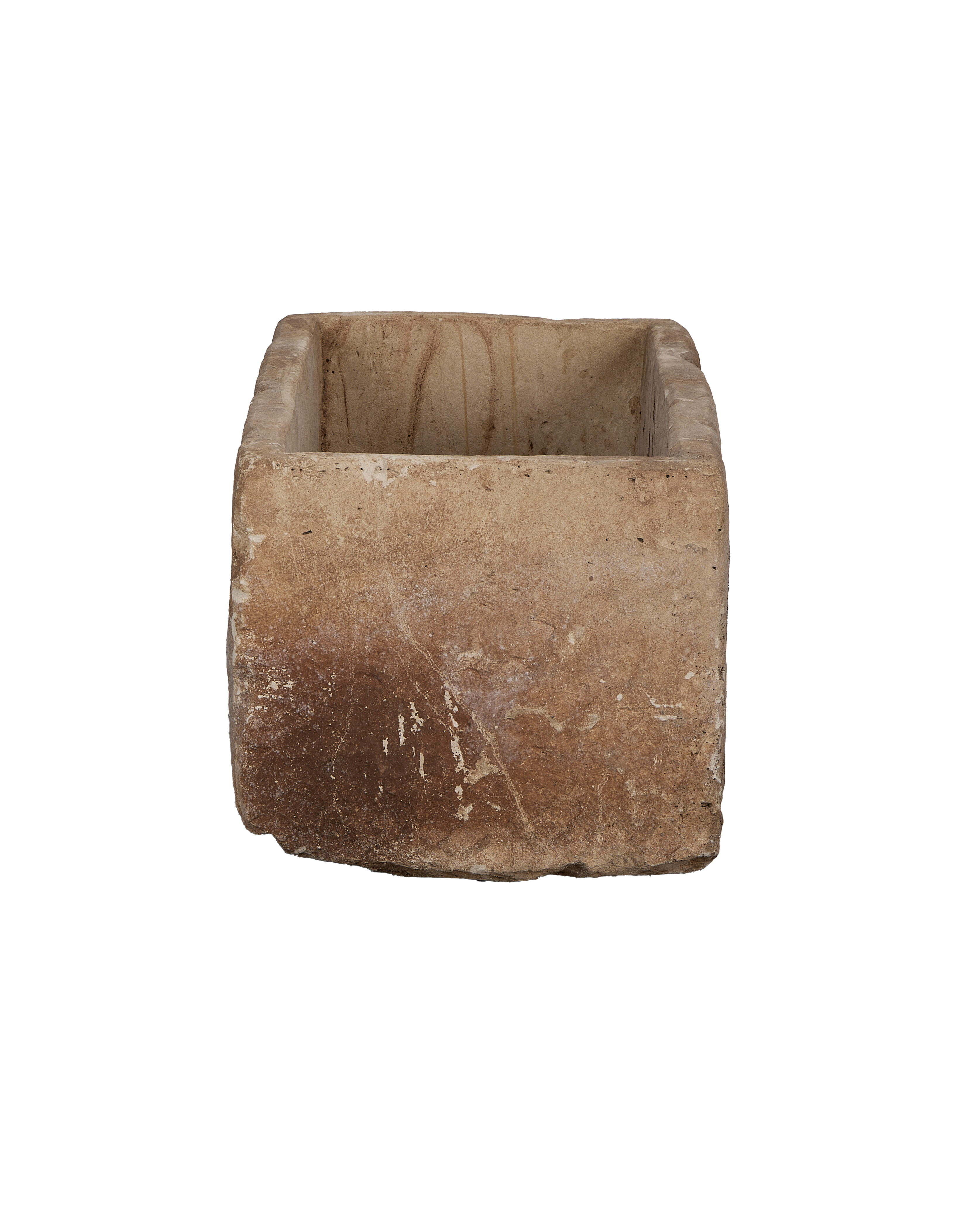 Vintage Indonesian limestone trough, top opening detail, rough textured surface, weathering around rim.