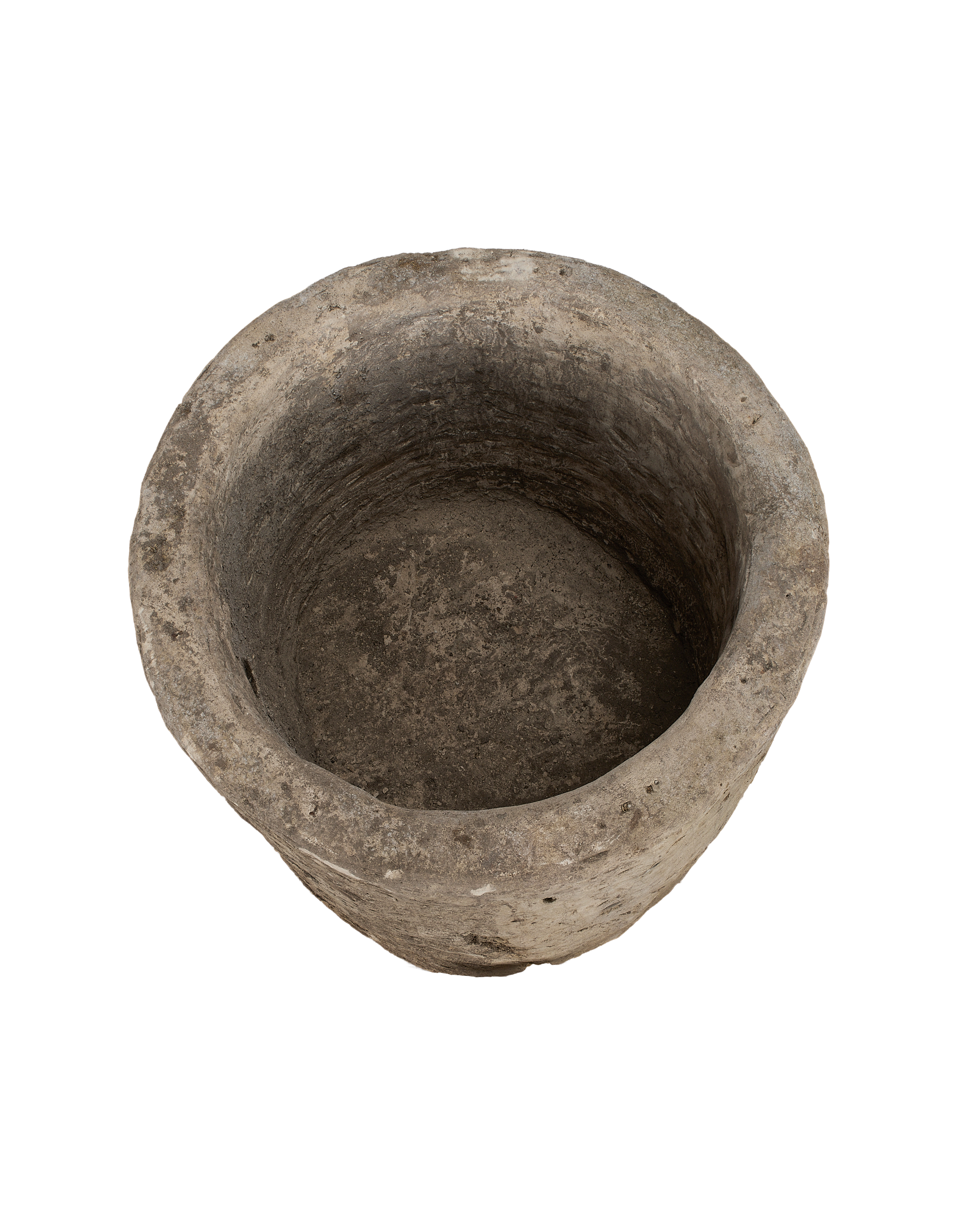 Vintage Indonesian round limestone trough, showing weathered interior surface and rustic texture.