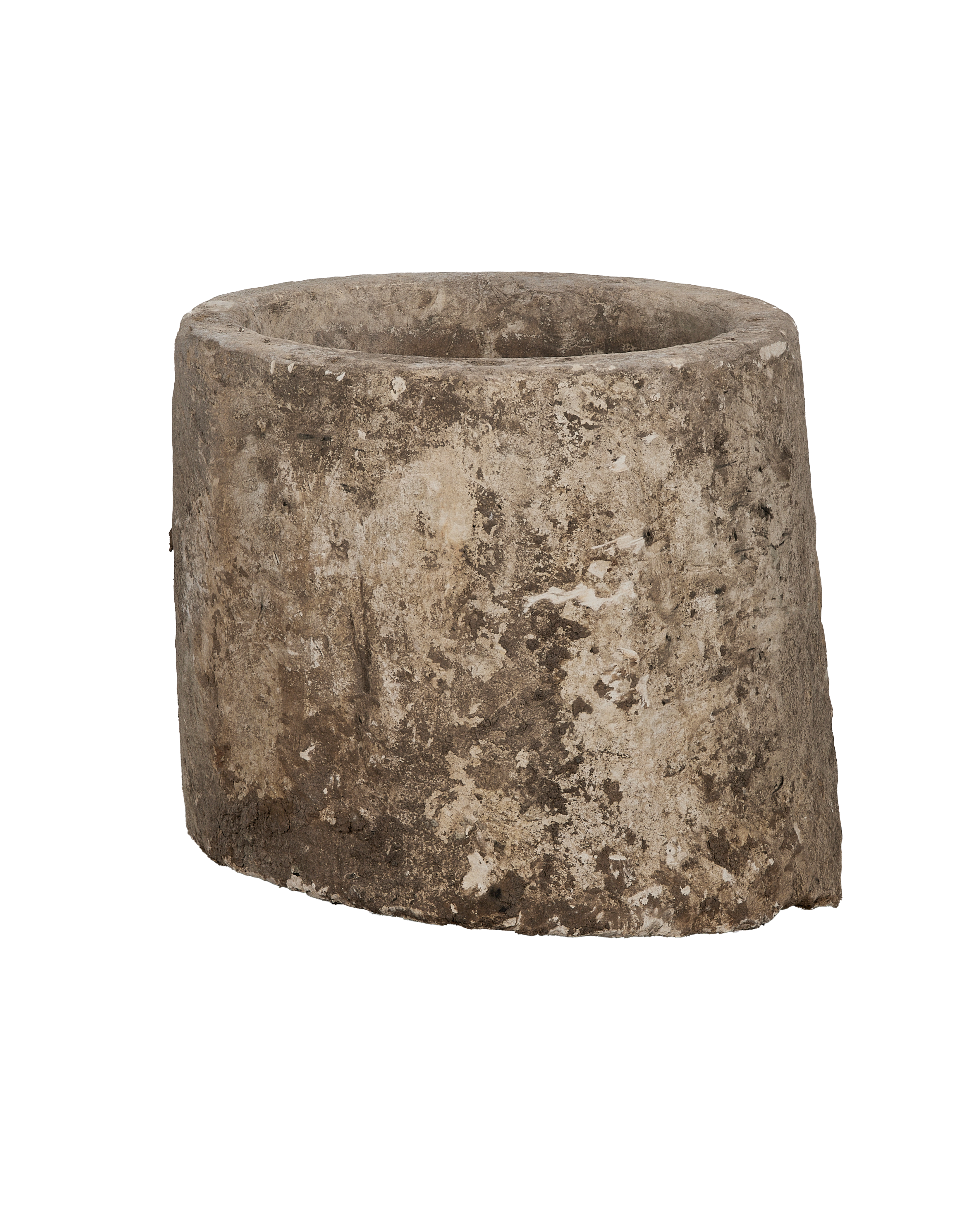 Vintage Indonesian round limestone trough, showing distressed texture and aged patina, side view.