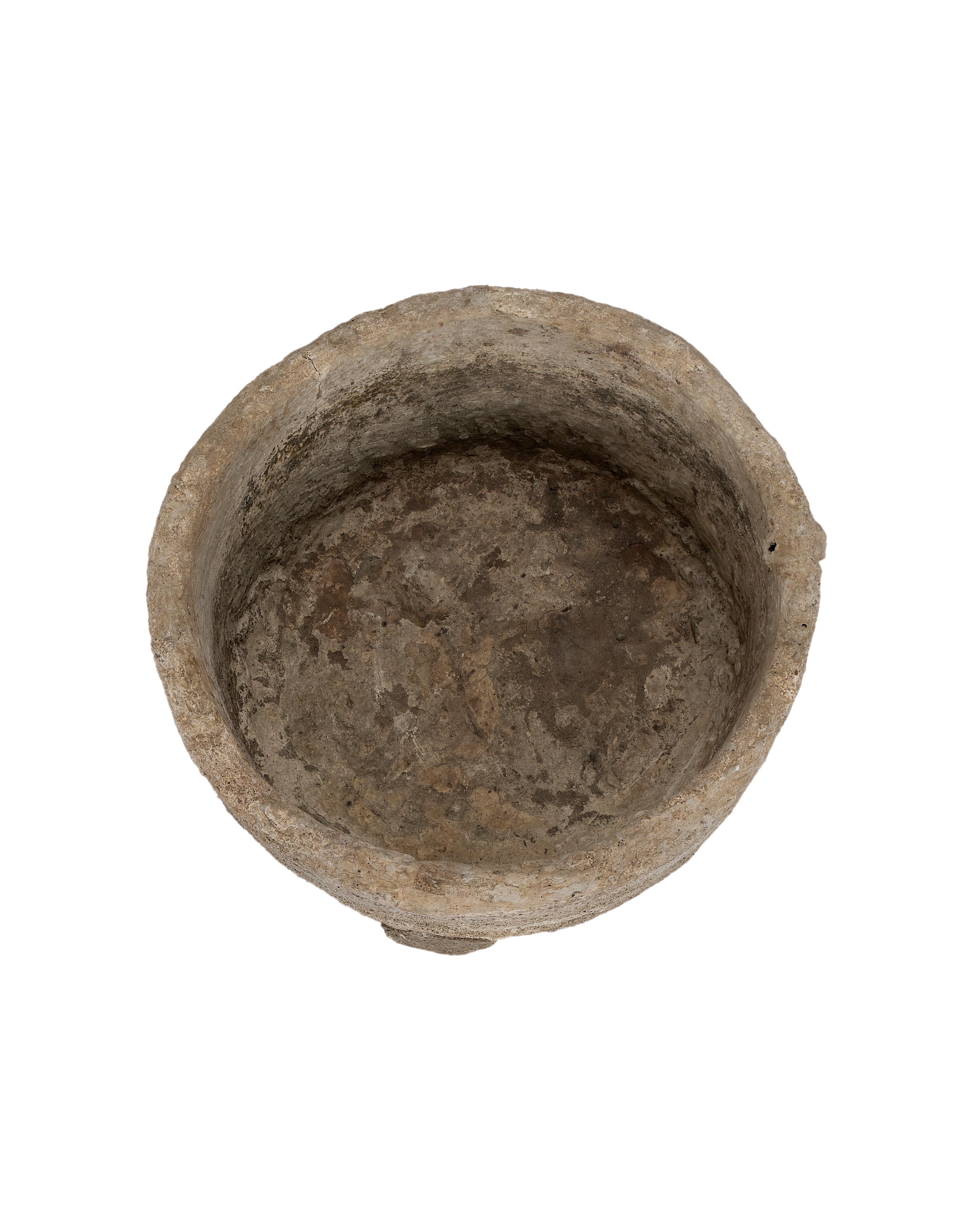 Vintage round Indonesian limestone trough, top-down view showing interior texture.