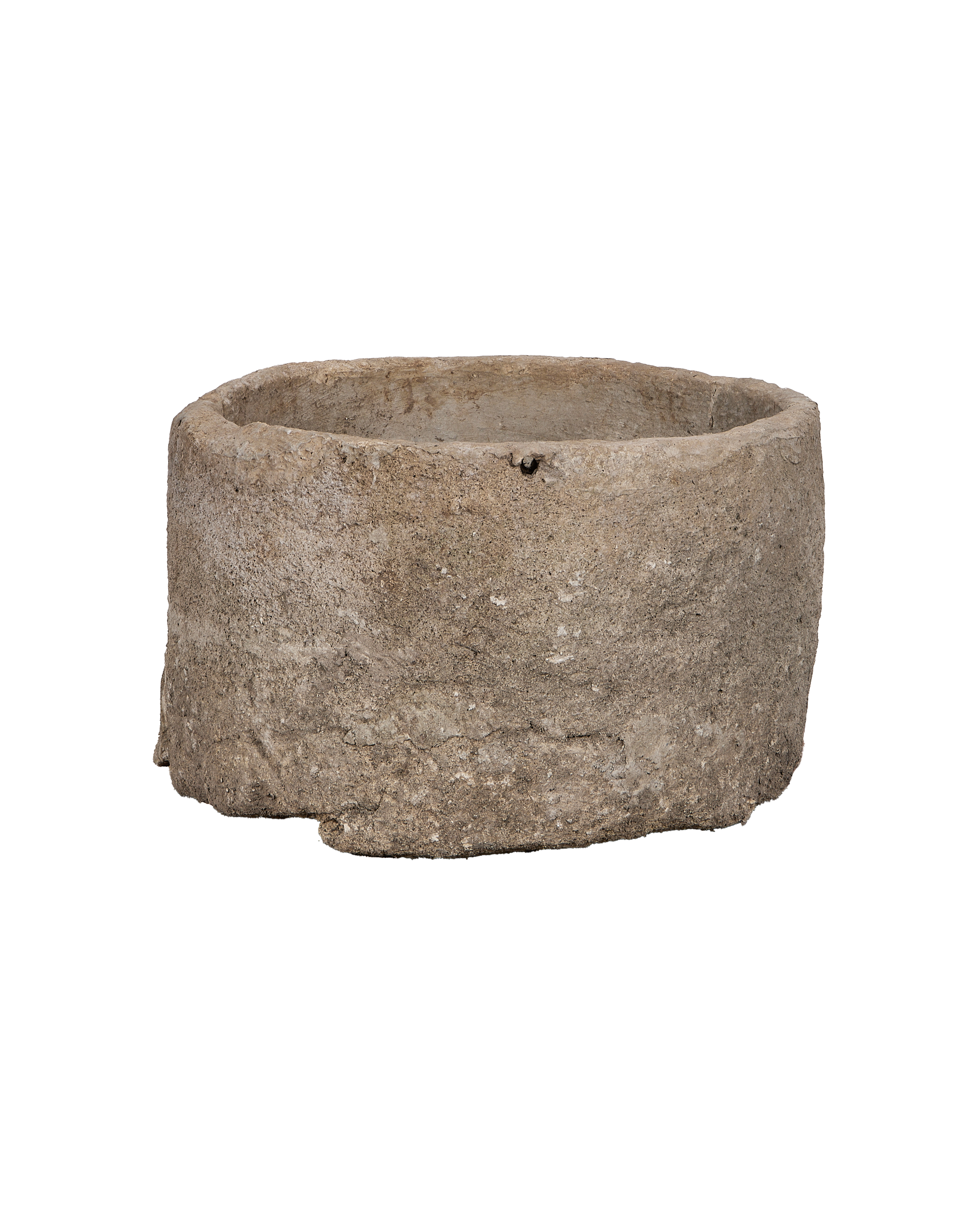 Vintage Indonesian limestone OAK trough: closeup of an irregularity with a visible hole.