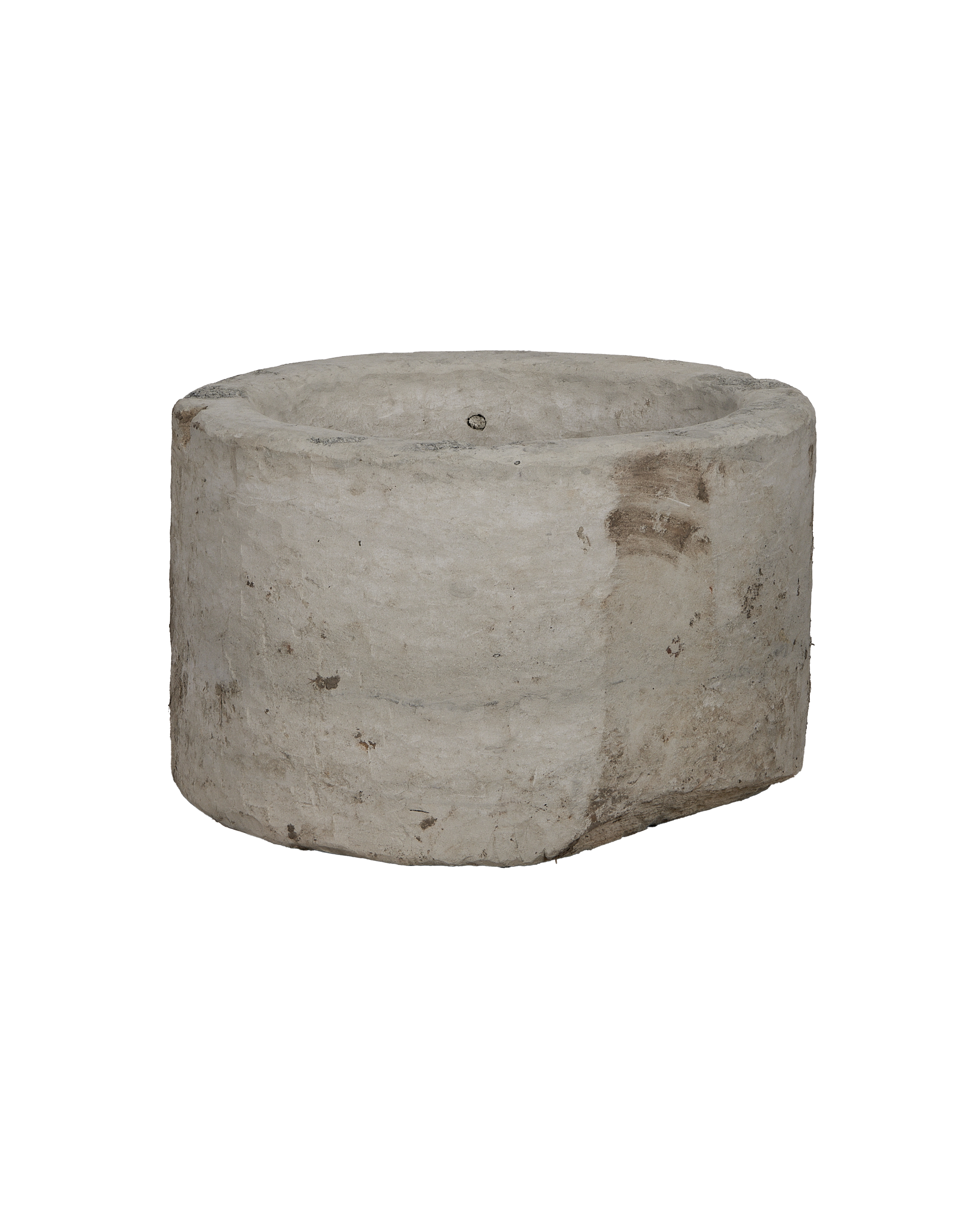 Vintage Indonesian round limestone trough, showing surface texture and patinated condition.