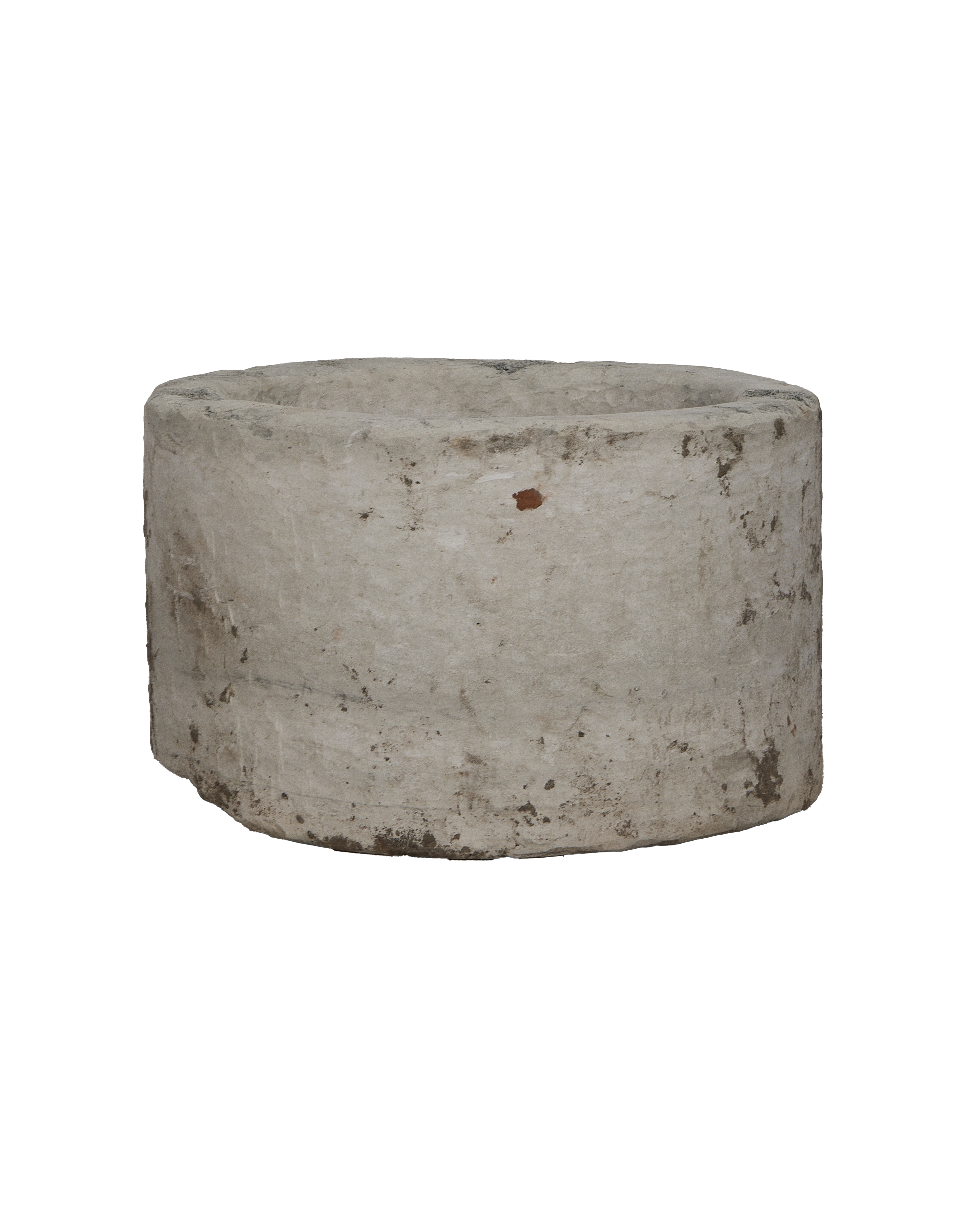 Vintage round Indonesian limestone trough, showing its weathered texture and sturdy, rustic circular form.
