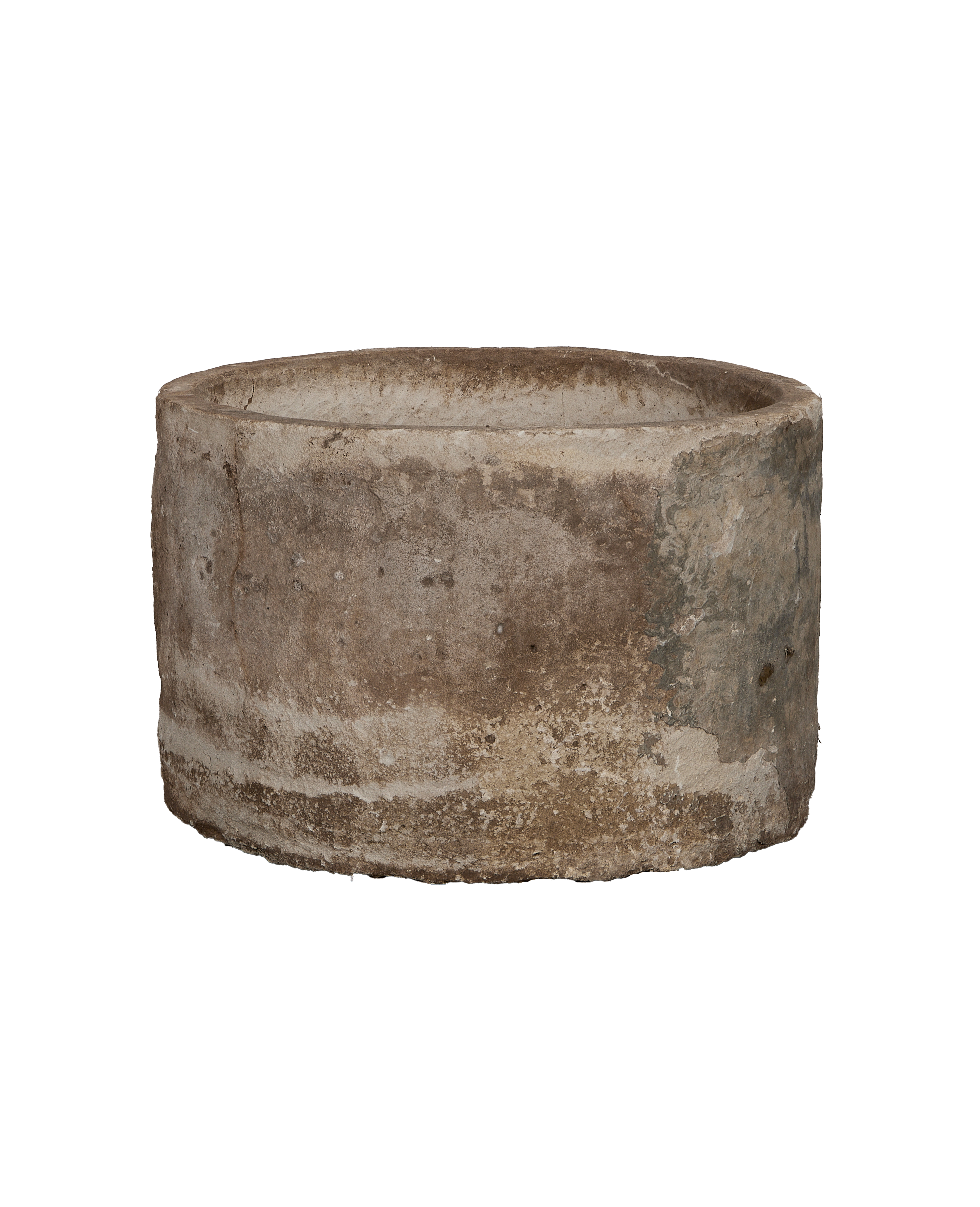 Vintage round Indonesian limestone trough, showing weathered texture and natural gray-brown patina.