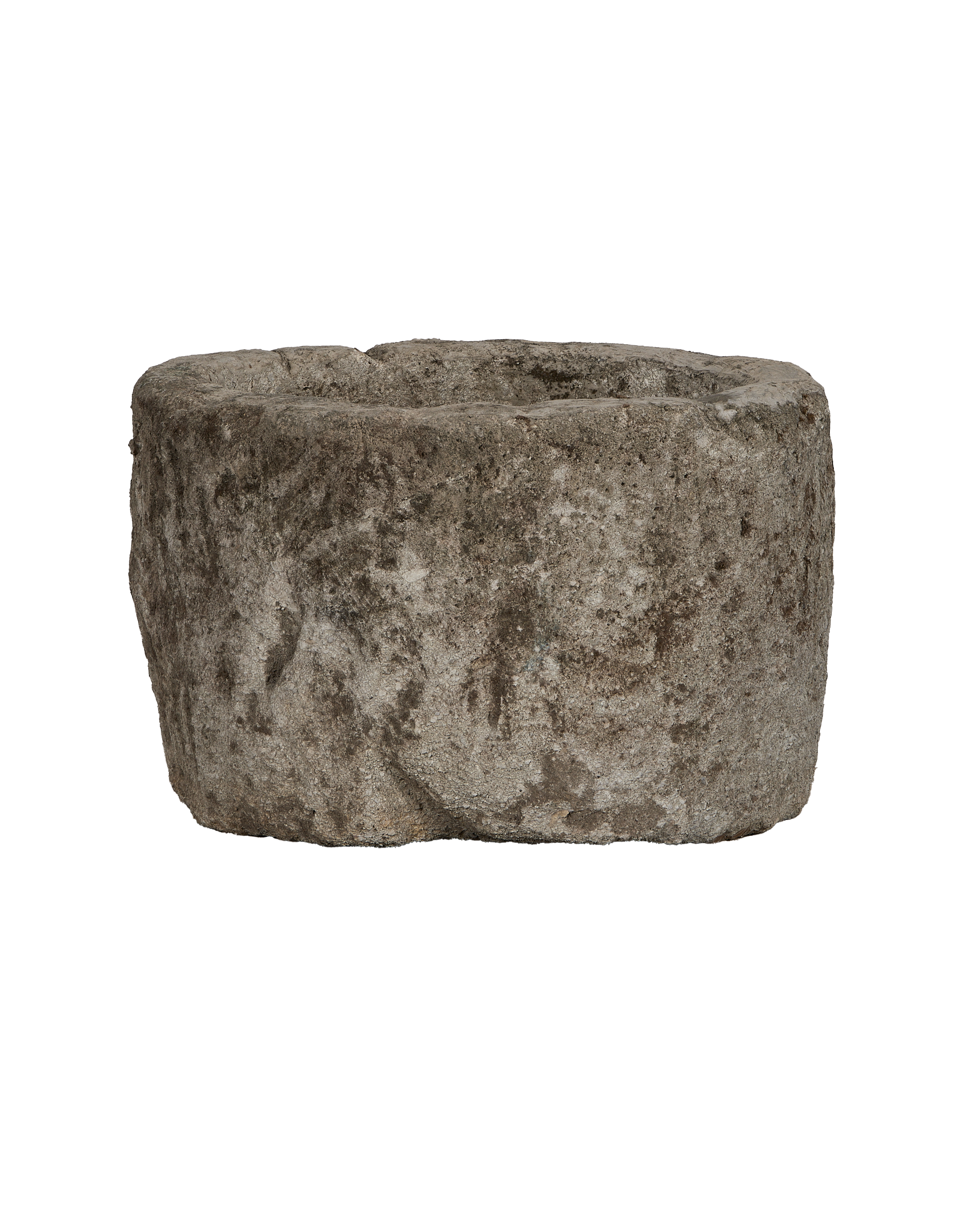 Vintage round limestone trough, rough texture with aged patina, from above.