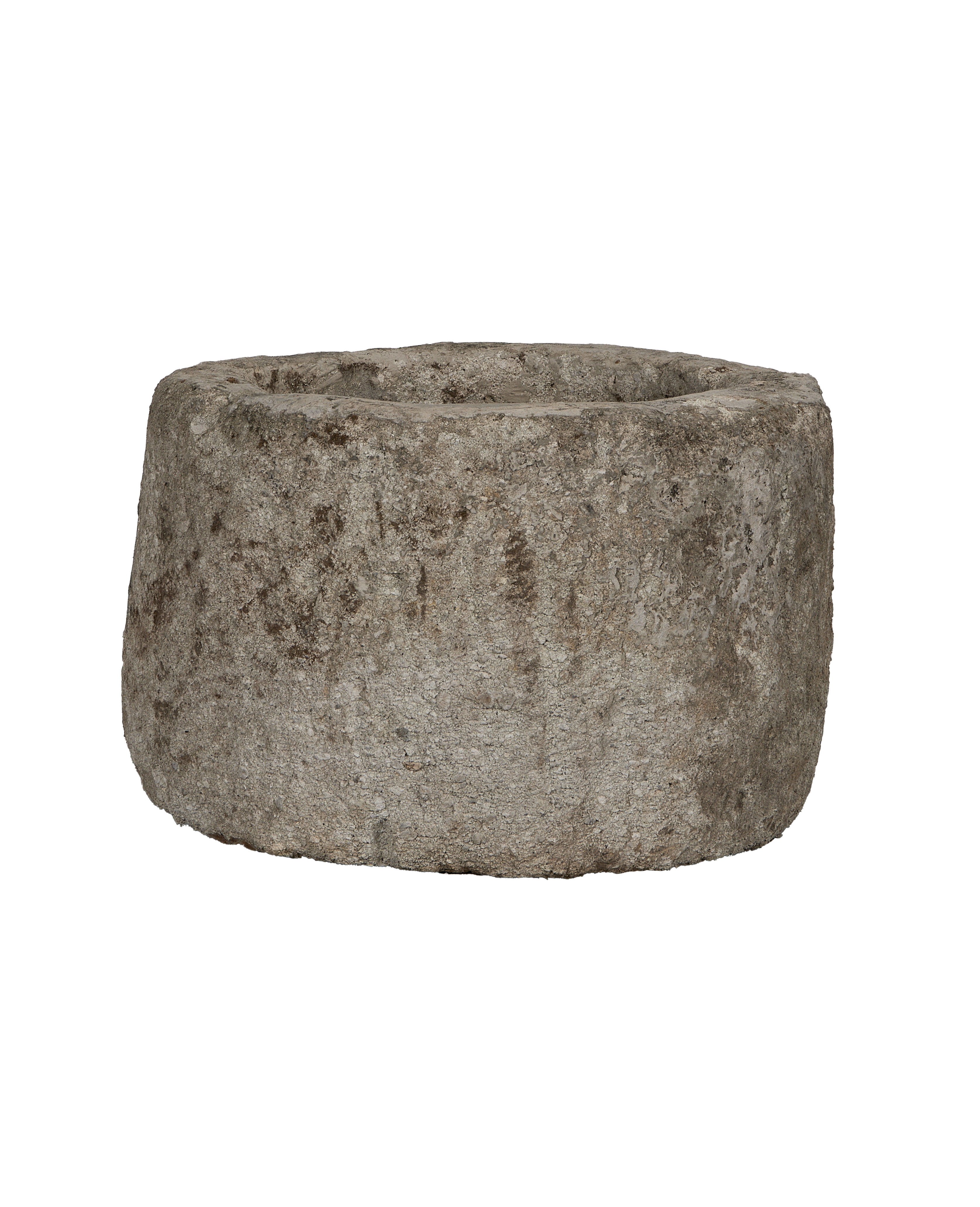 Vintage round Indonesian limestone trough, showing gray weathered surface texture, unique close-up.