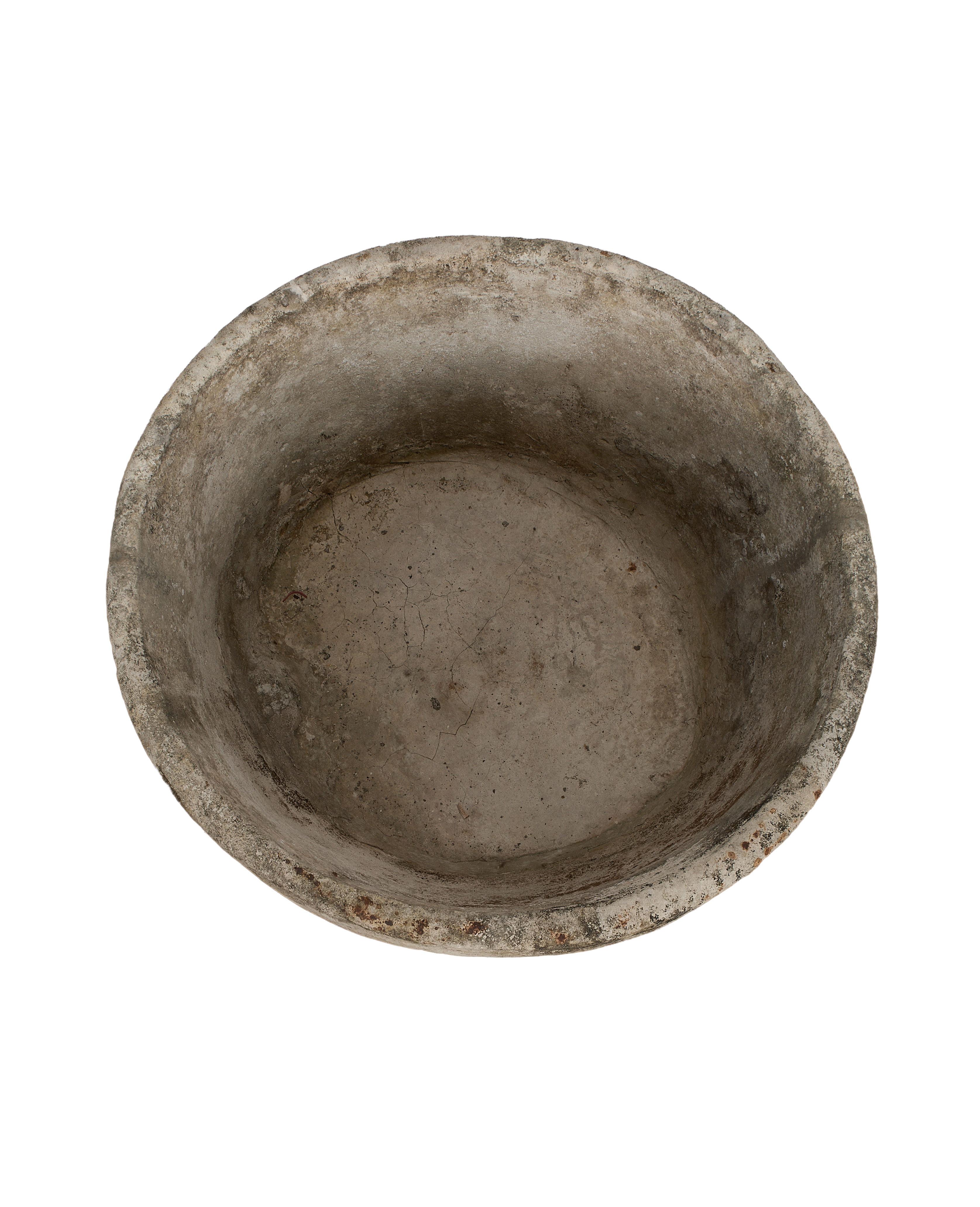 Vintage Indonesian round limestone trough, top view showing weathered texture and cracks.