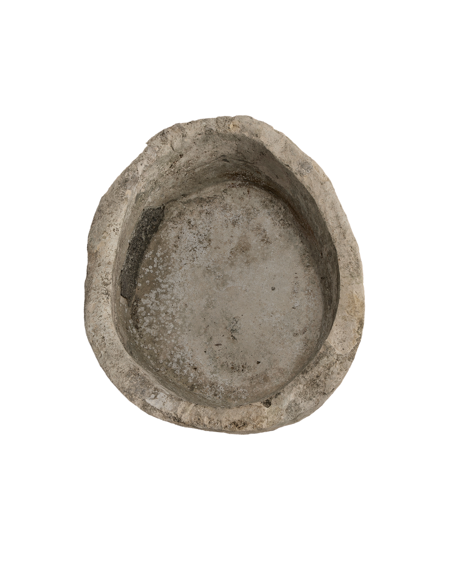 Vintage Indonesian limestone trough bird's-eye view, showing the heavily patinated oblong interior.