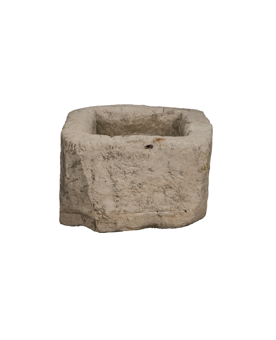Vintage rough-hewn rectangular limestone trough from Indonesia, showcasing interior texture detail.