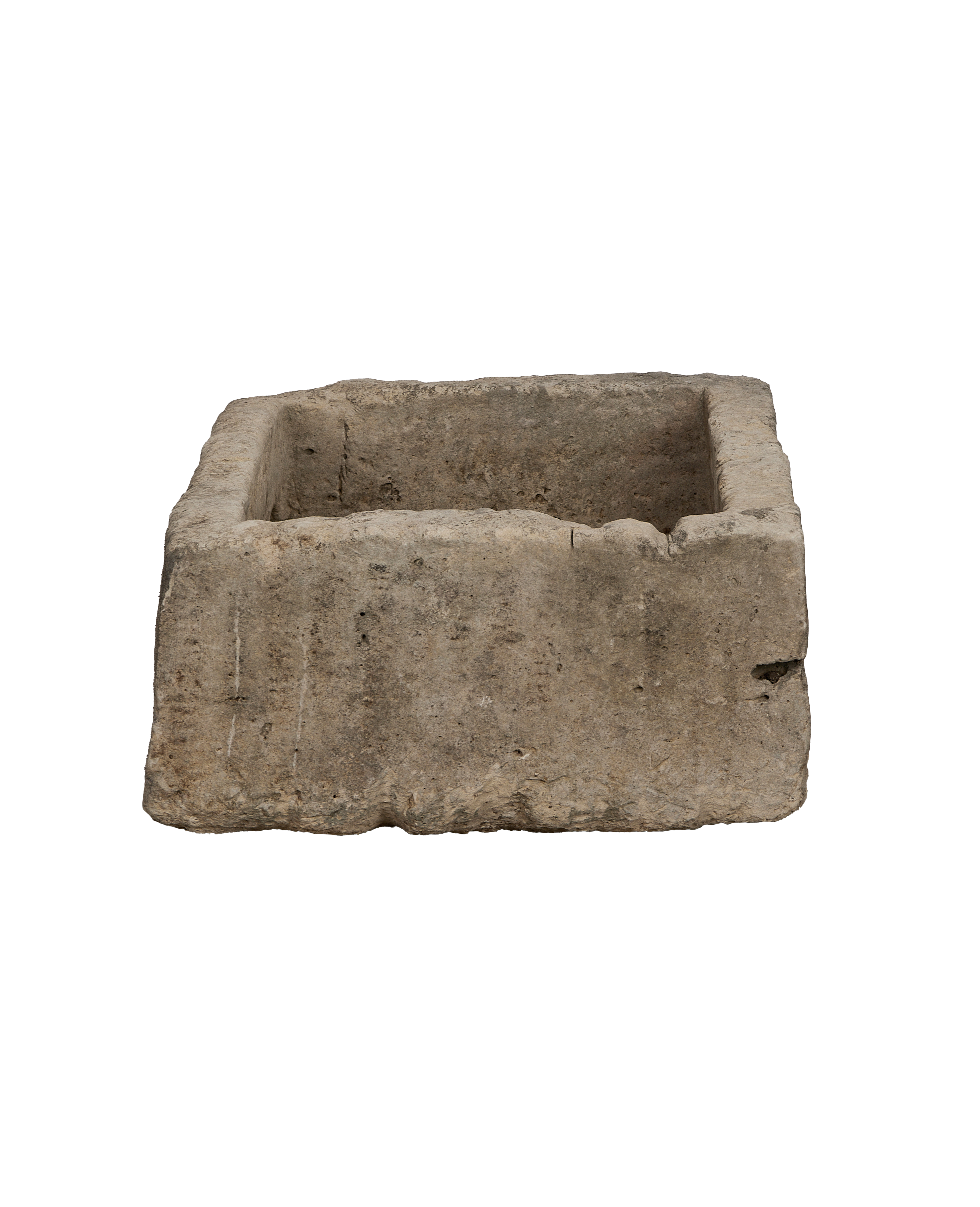 Vintage Indonesian rectangular limestone trough, detailed rough-hewn exterior texture, top-down view.