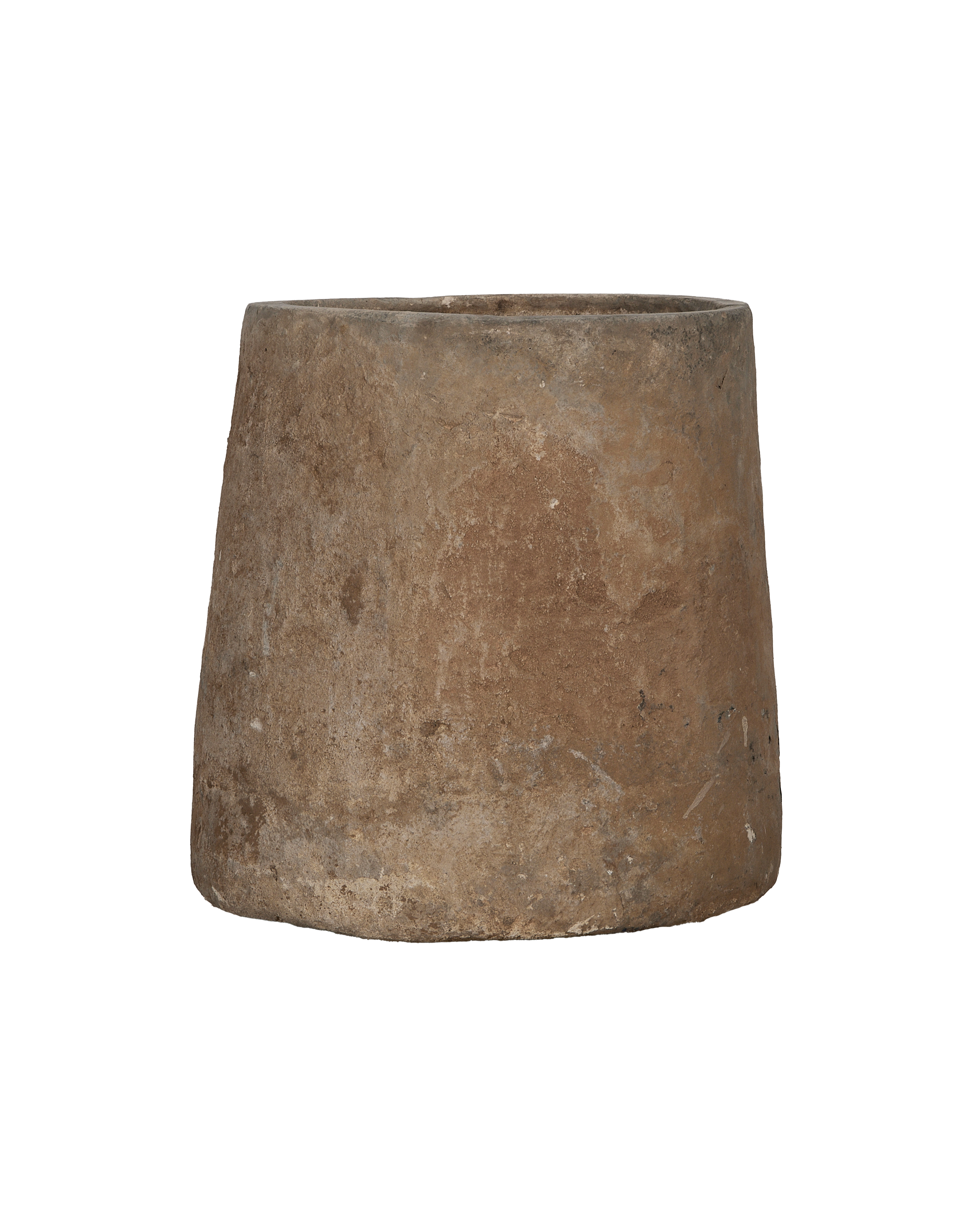 Vintage limestone trough, round, showcasing worn condition and weathered patina from a side angle.