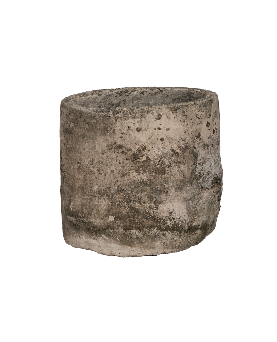 Vintage Indonesian round limestone trough, showing weathered texture and natural imperfections from above.