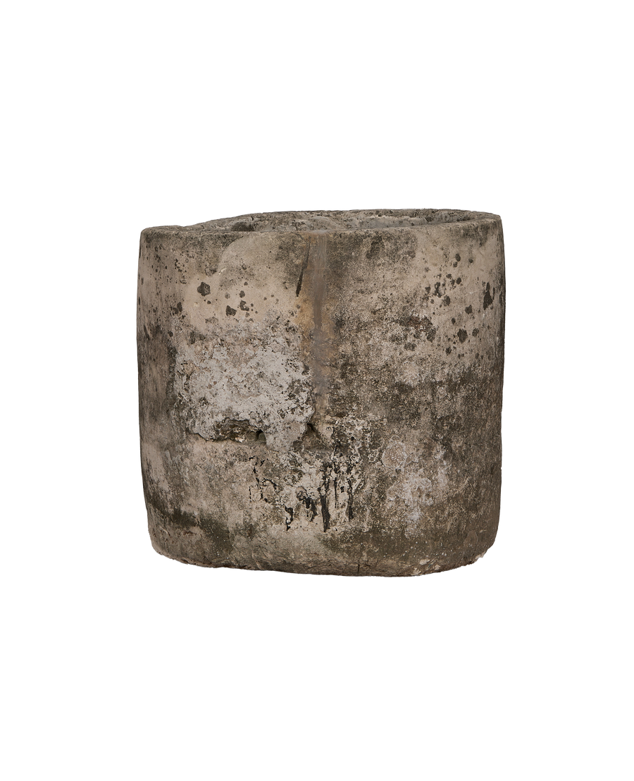 Vintage round limestone trough from Indonesia, showing rough texture and unique weathered patina.
