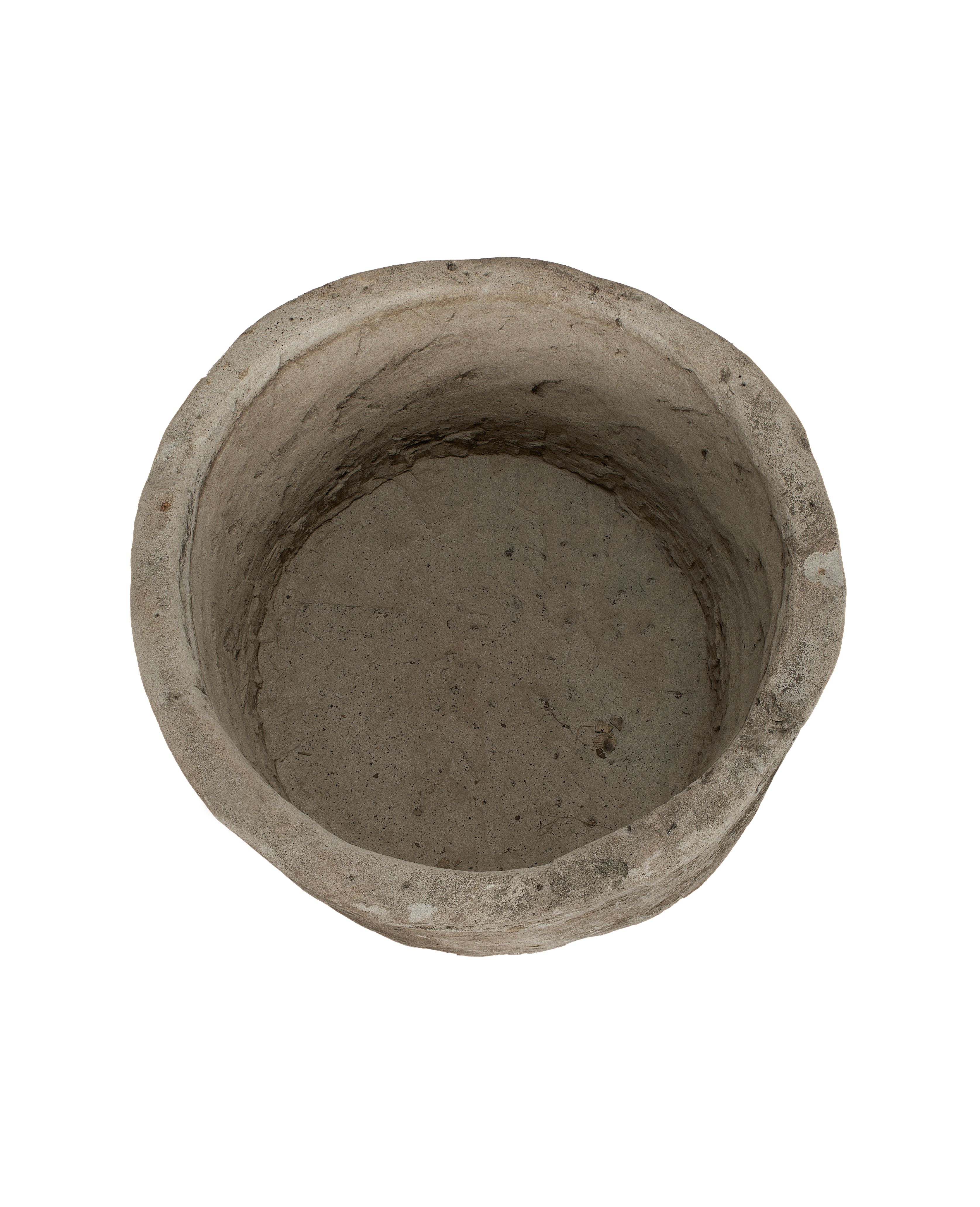Vintage Indonesian limestone trough, top-down view showing interior circular texture.