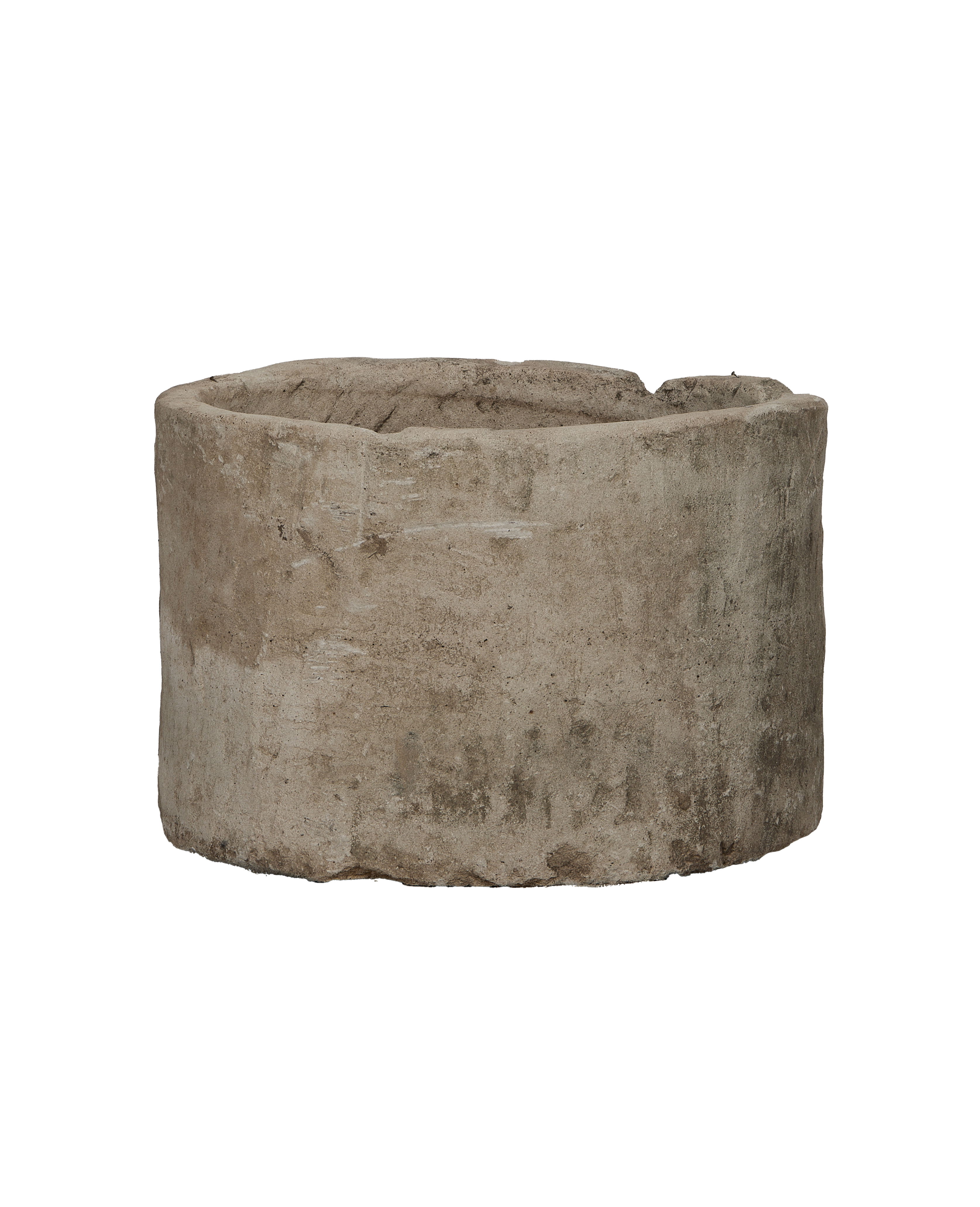 Vintage round Indonesian limestone trough, showing surface texture and weathered patina.