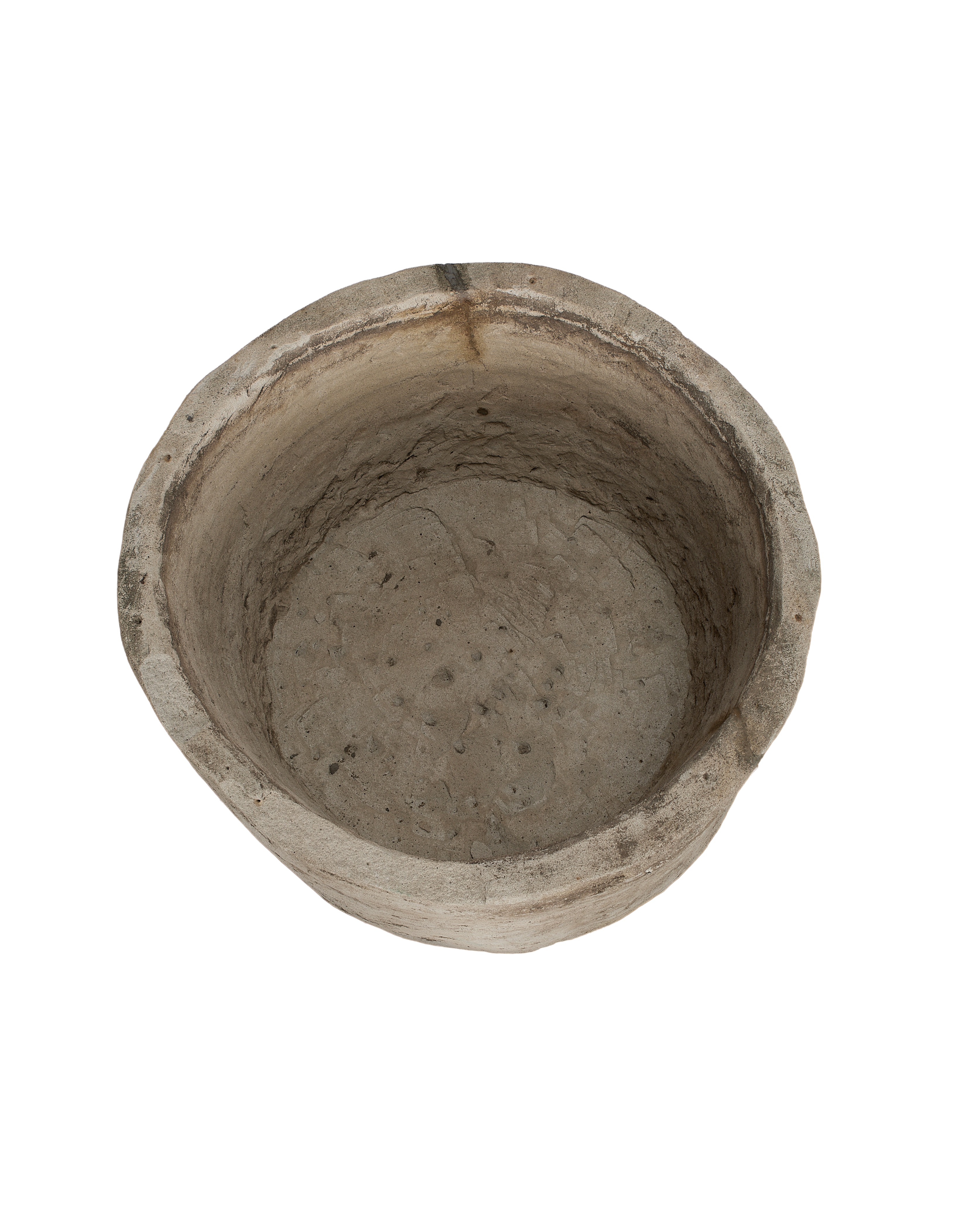 Vintage round Indonesian oak limestone trough, top view of weathered, textured interior.
