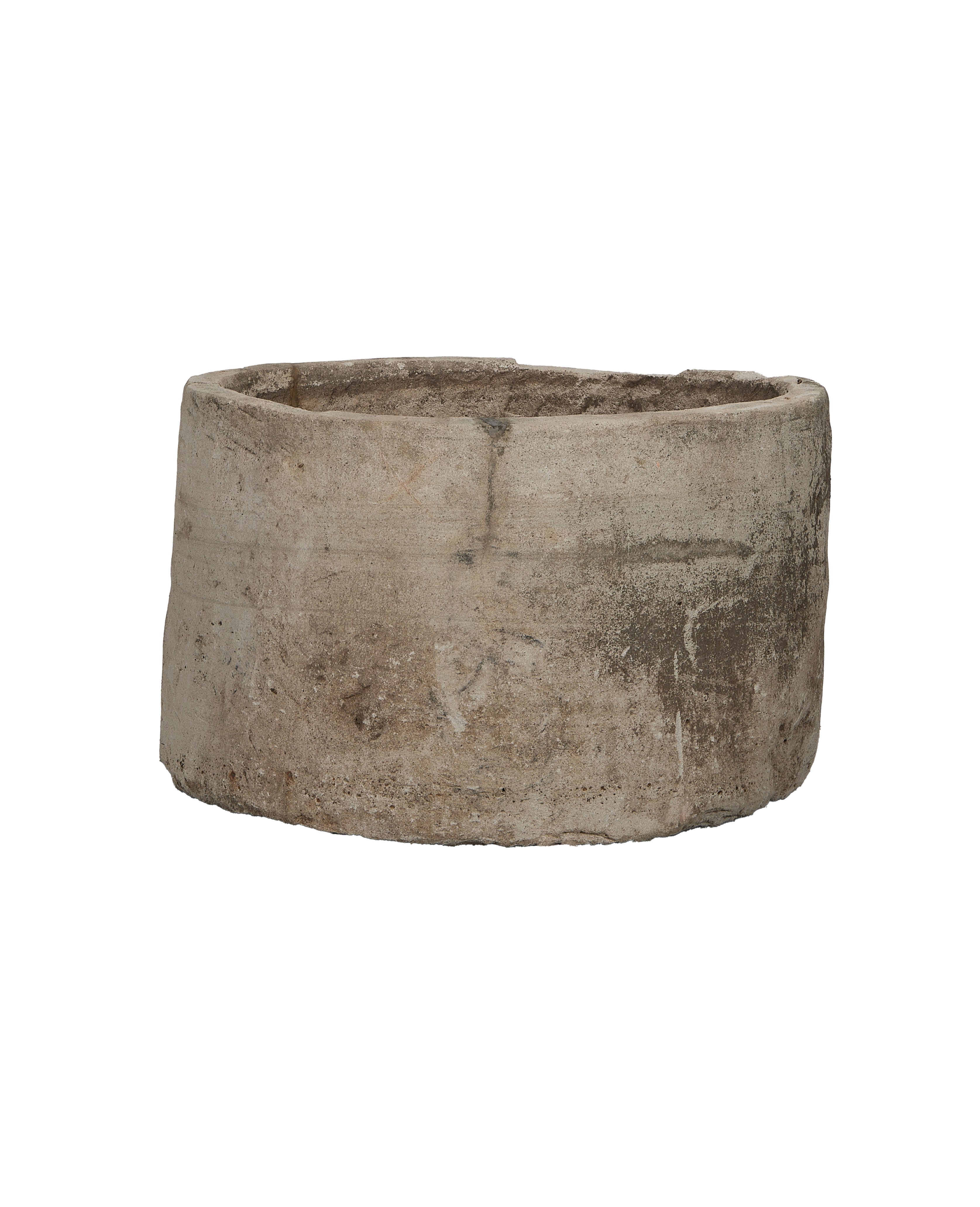 Vintage round Indonesian limestone trough, top-down view showing interior texture and rim.