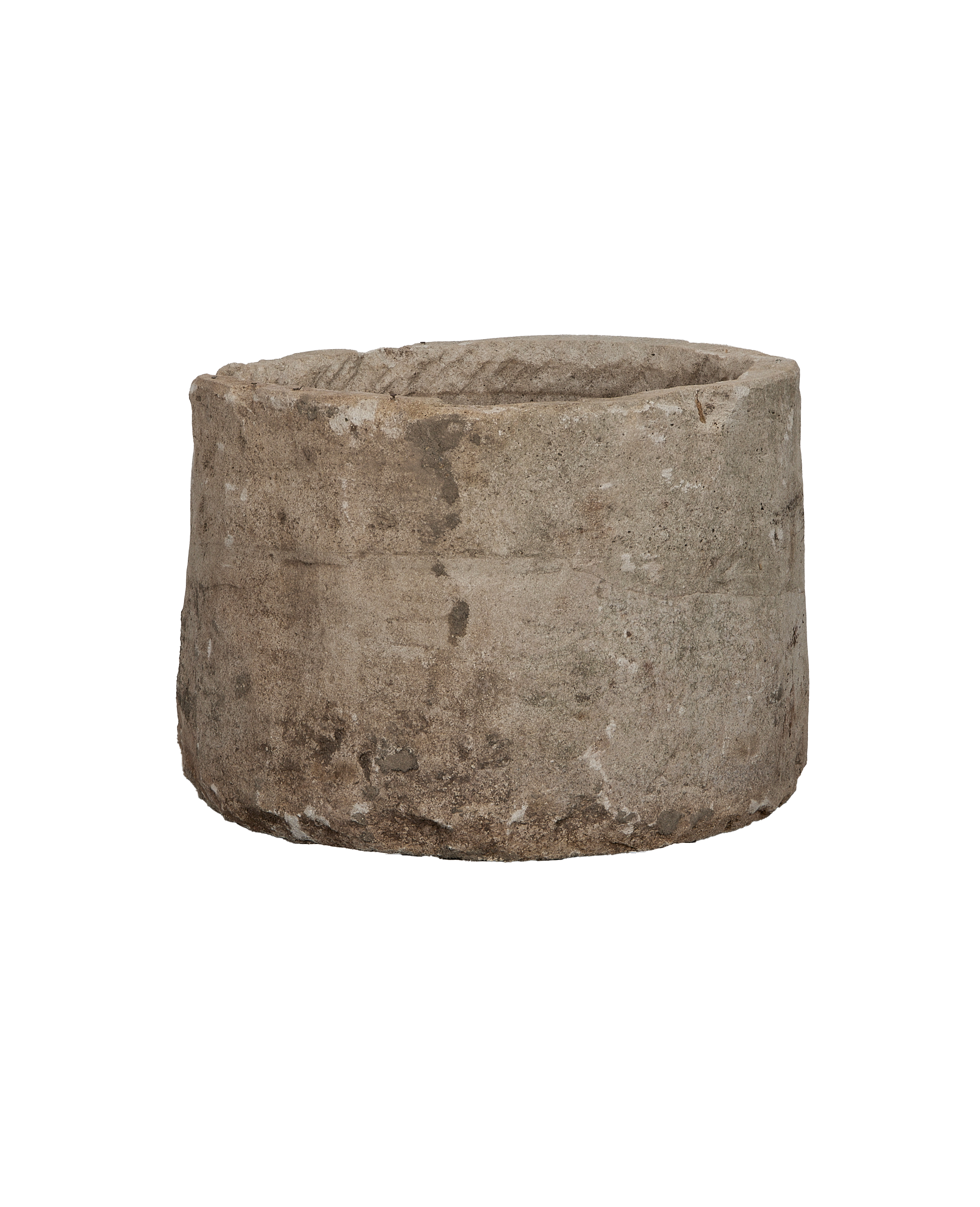 Vintage Indonesian round limestone trough, showing weathered texture and natural imperfections.