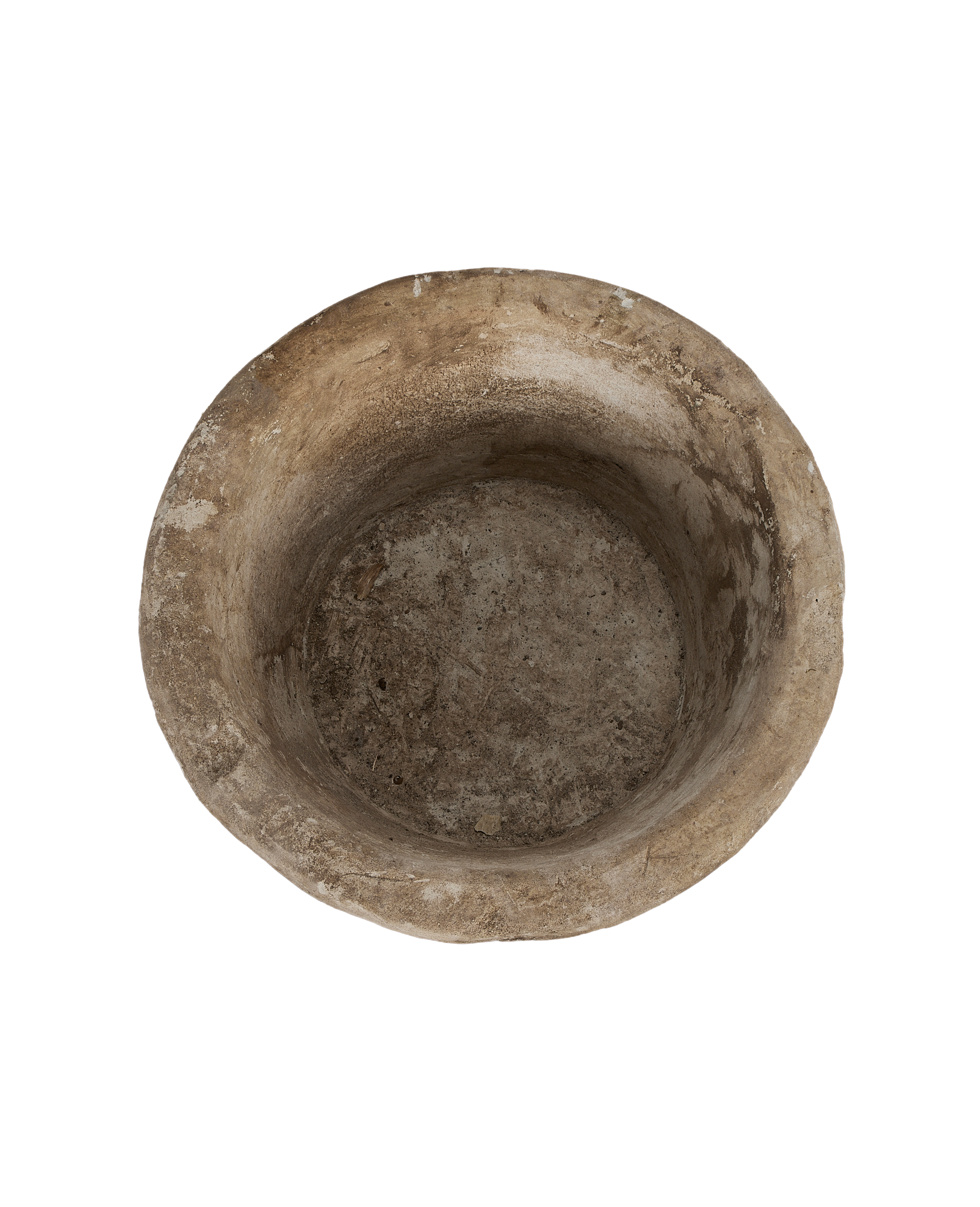 Vintage round limestone trough, top-down view showing interior depth and texture.