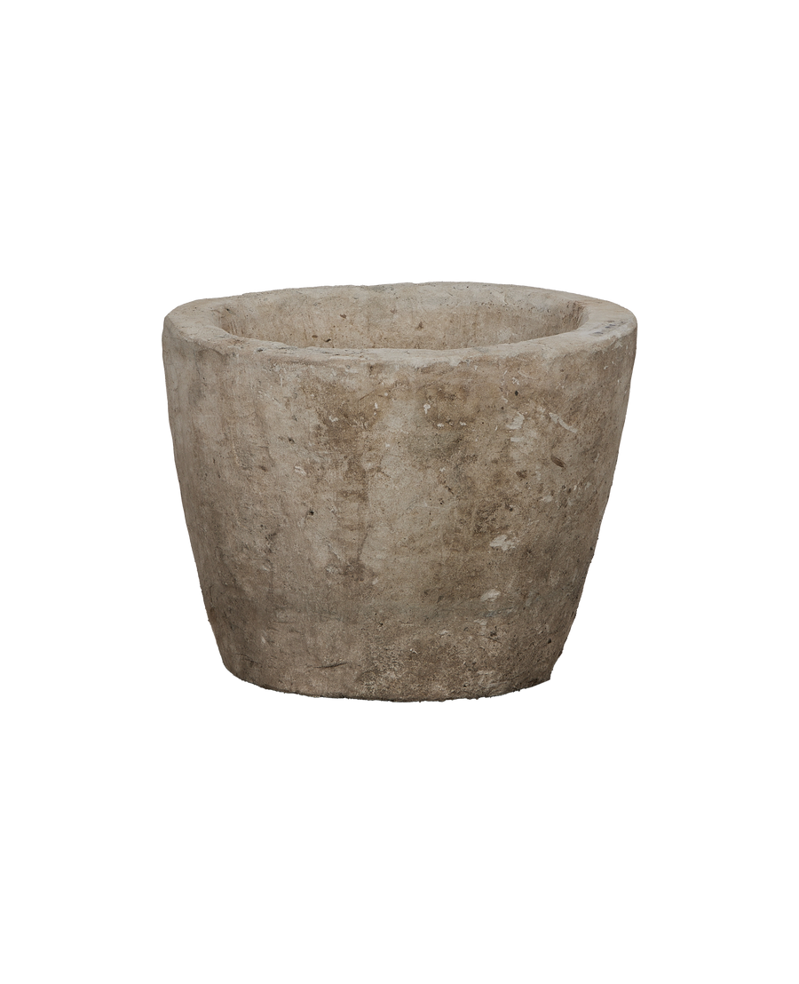 Vintage Limestone Trough, weathered round Indonesian planter, low-angle showing exterior texture.