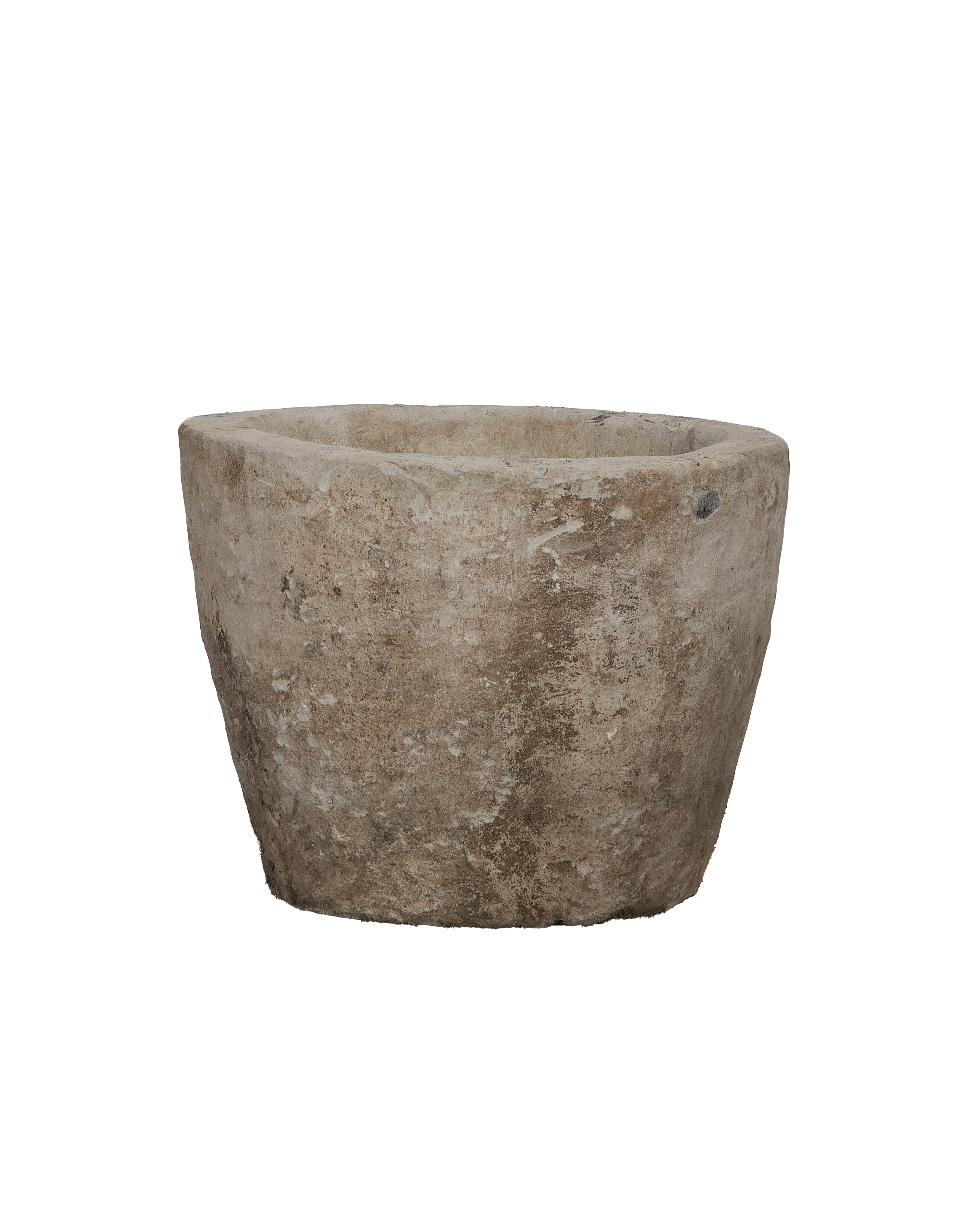 Vintage Indonesian round limestone trough, showing weathered texture from an elevated angle.