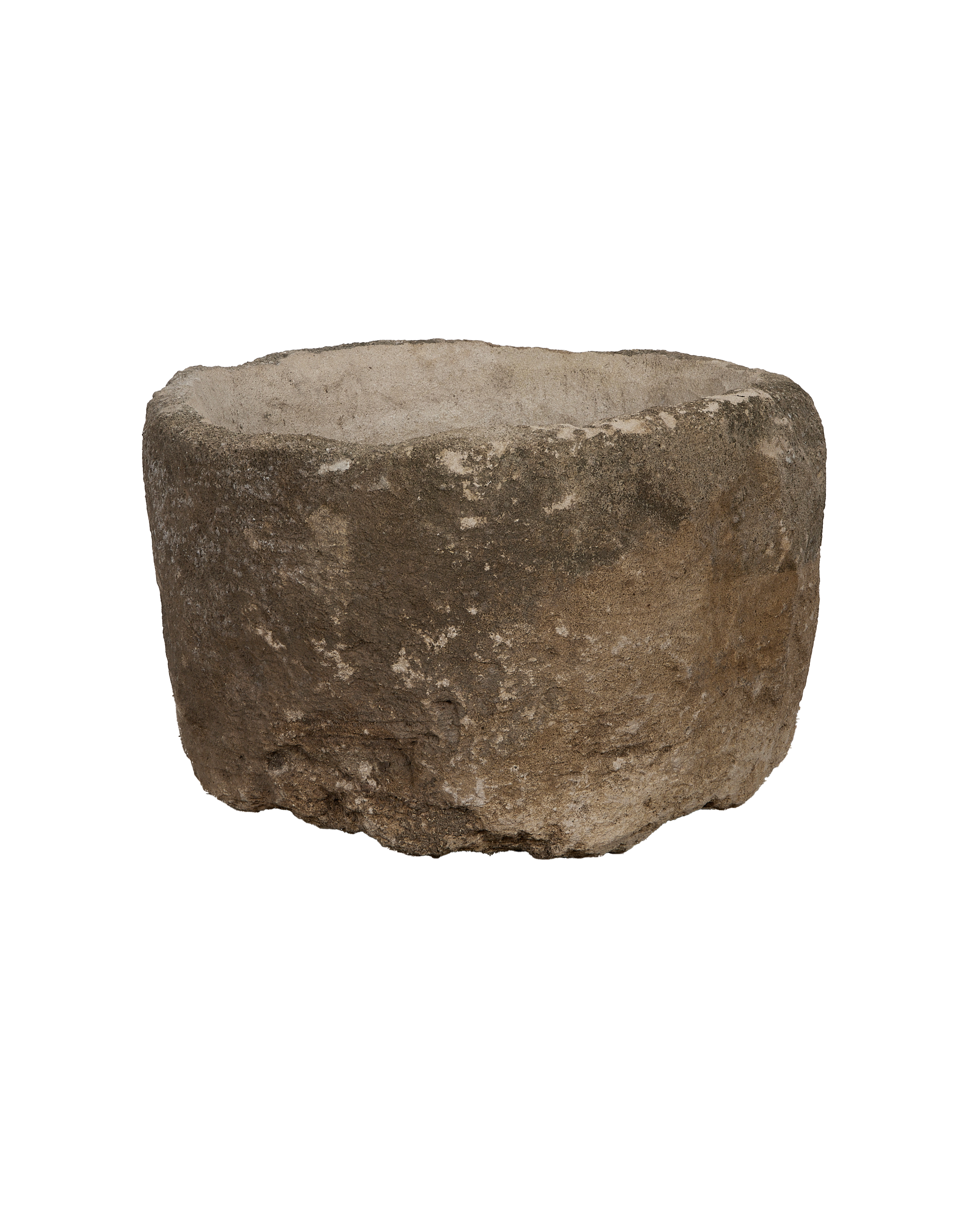 Vintage Indonesian round limestone trough with weathered, textured grey exterior and rough edges.