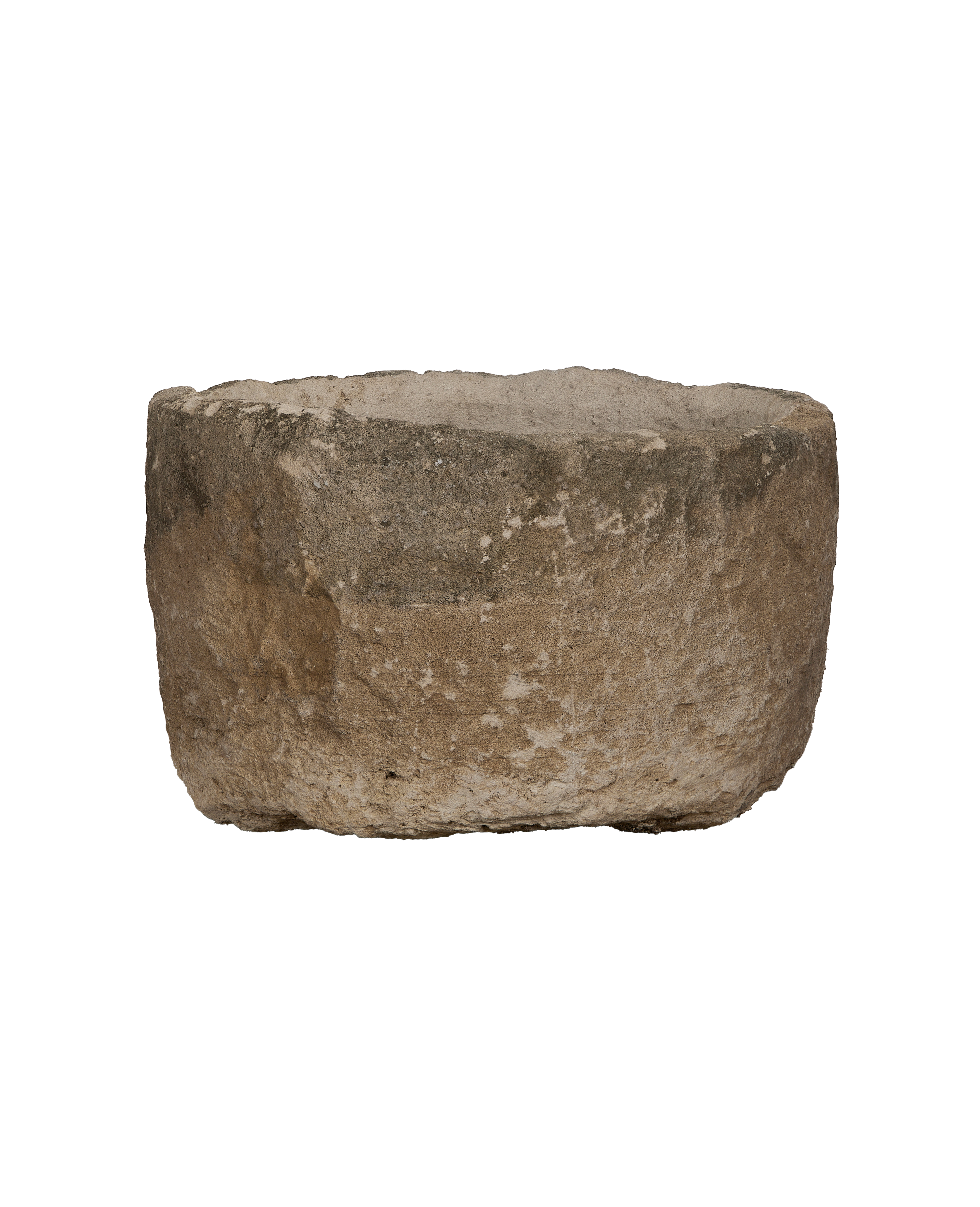 Vintage round Indonesian limestone trough, showing weathered texture from an elevated side view.