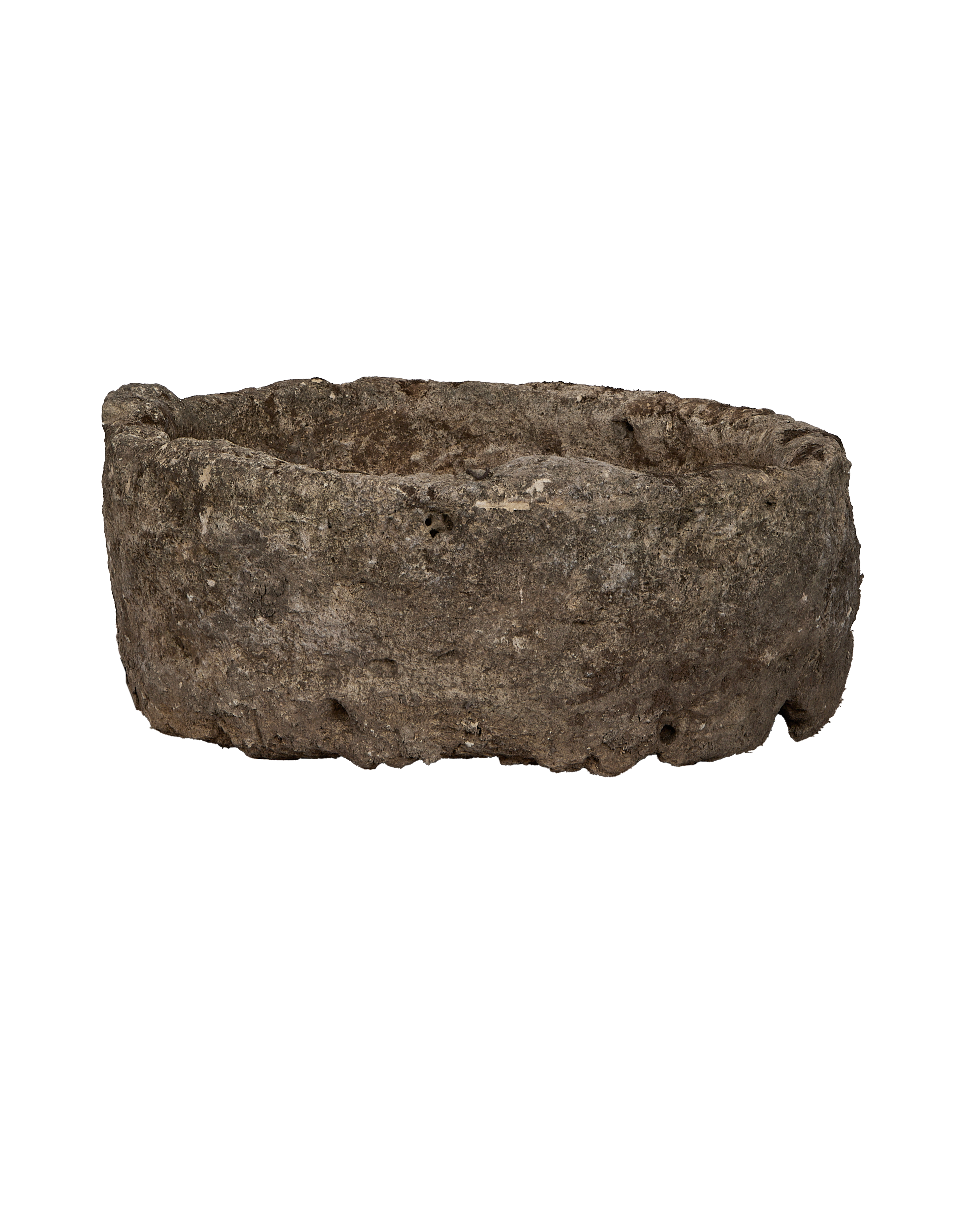 Vintage round Indonesian limestone trough, showcasing rustic texture, an antique garden planter.