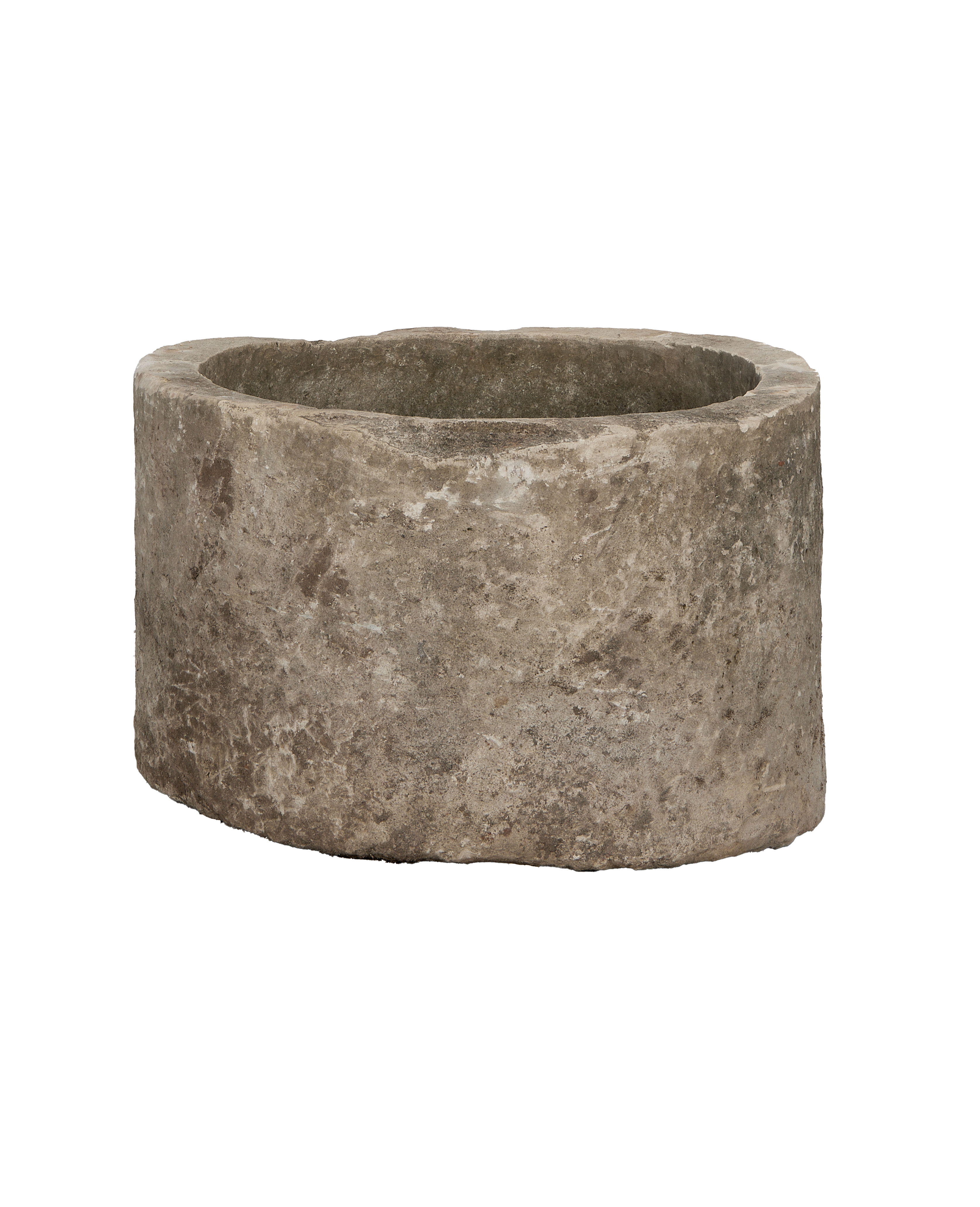 Vintage Indonesian limestone trough, round, showing detailed weathered stone texture.