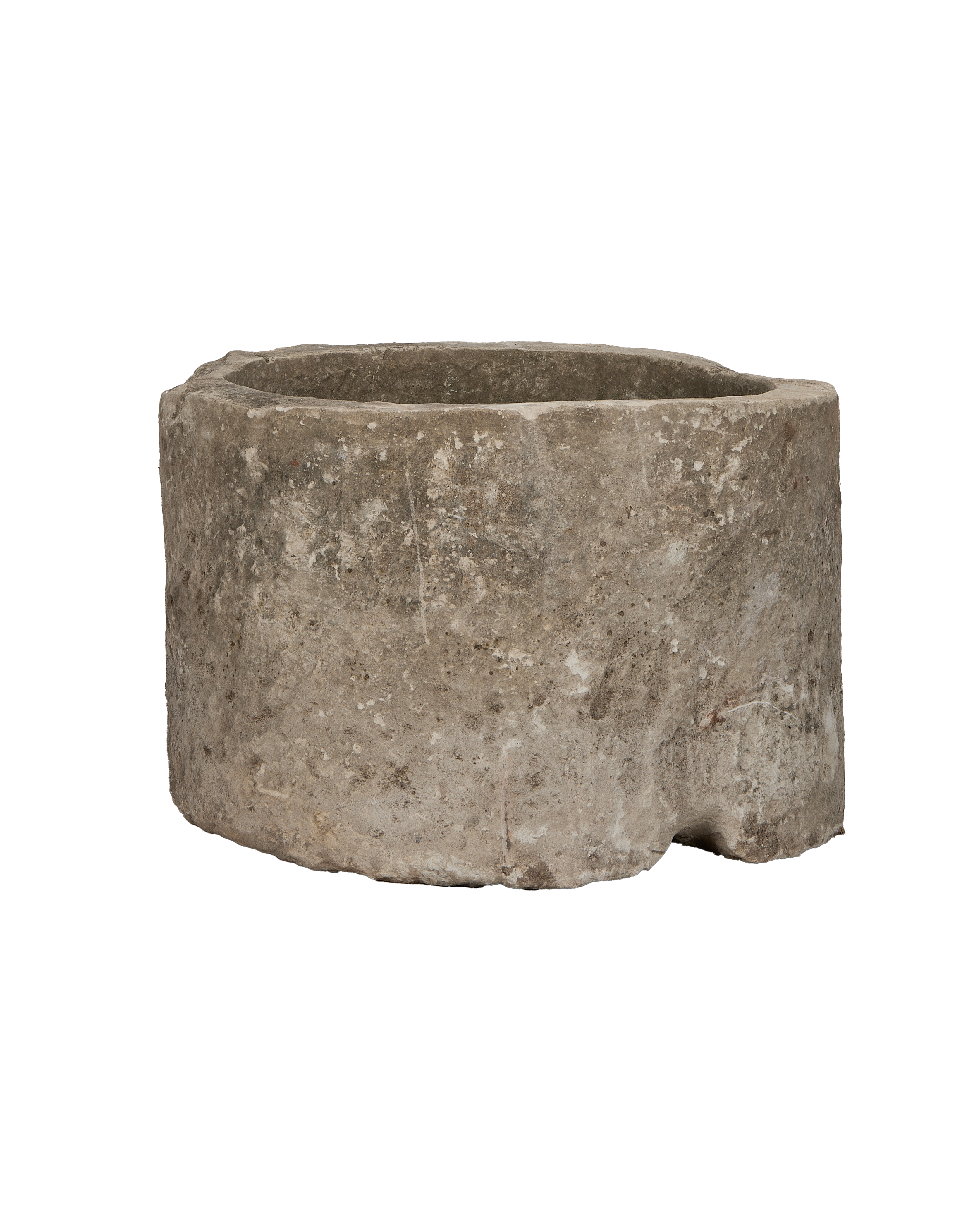 Vintage Indonesian round limestone trough, full side view, natural distressed texture.