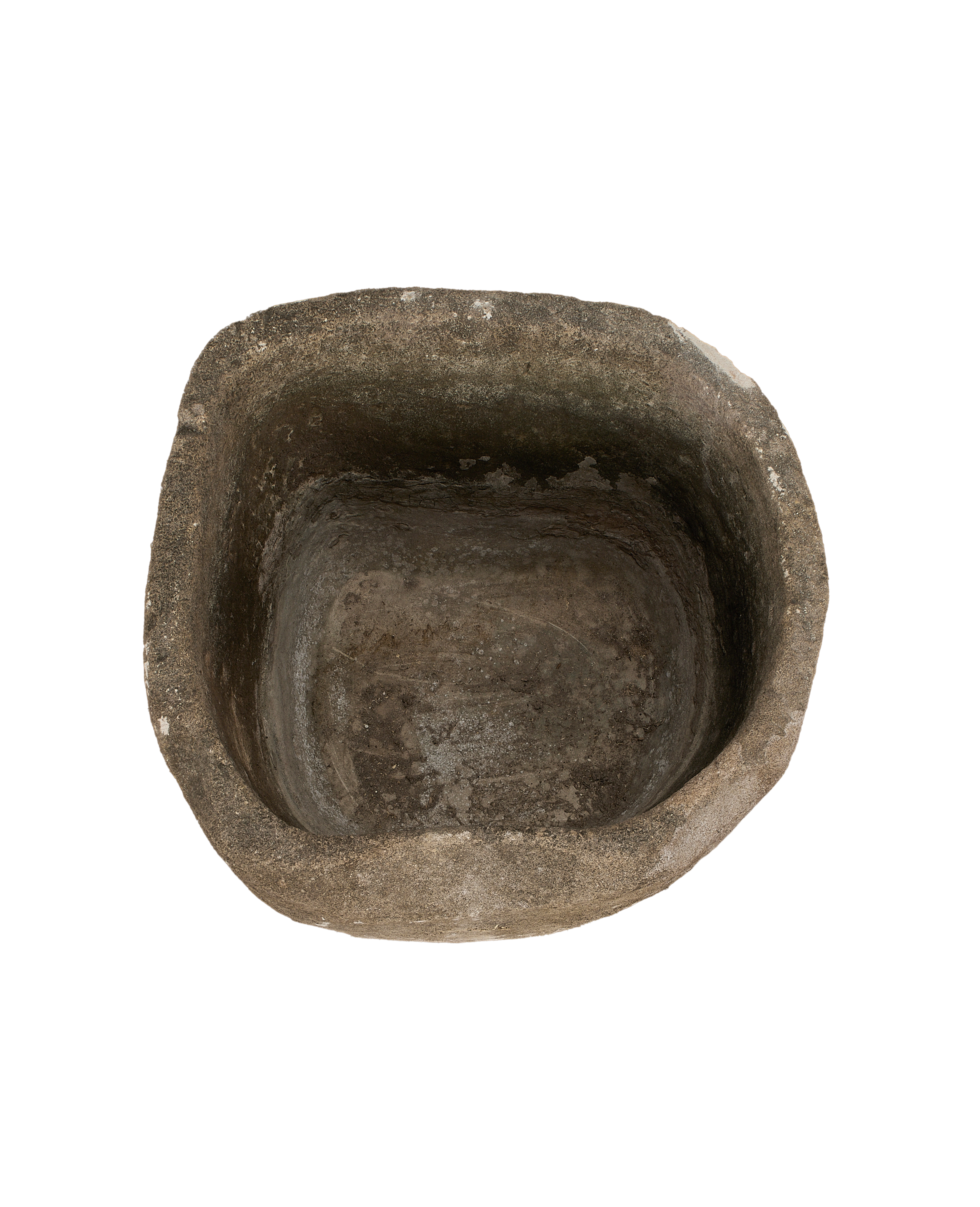 **Vintage Indonesian limestone trough, top-down view showing weathered texture and aged interior.**