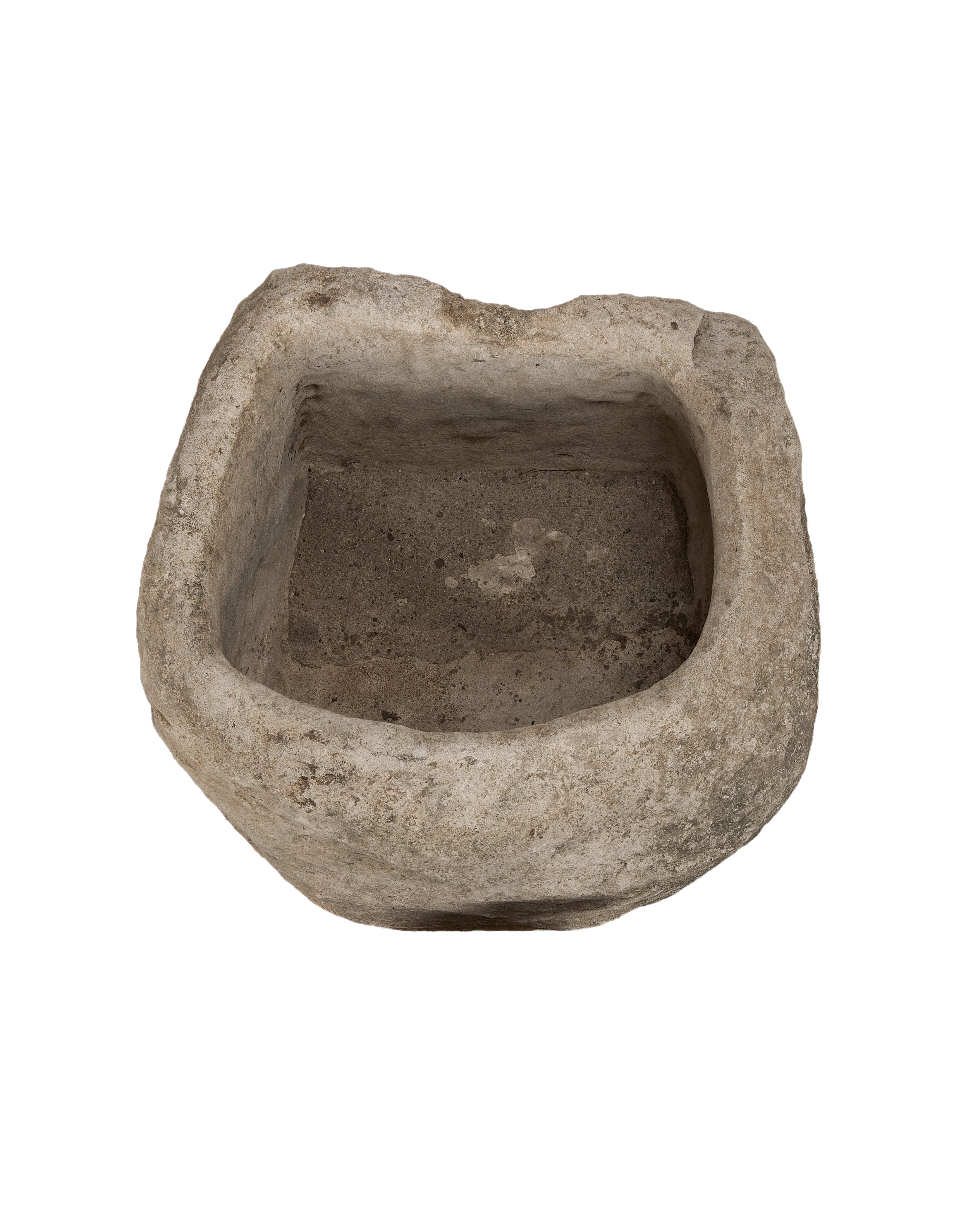 Top-down view of the vintage Indonesian limestone trough, highlighting its rough interior texture.