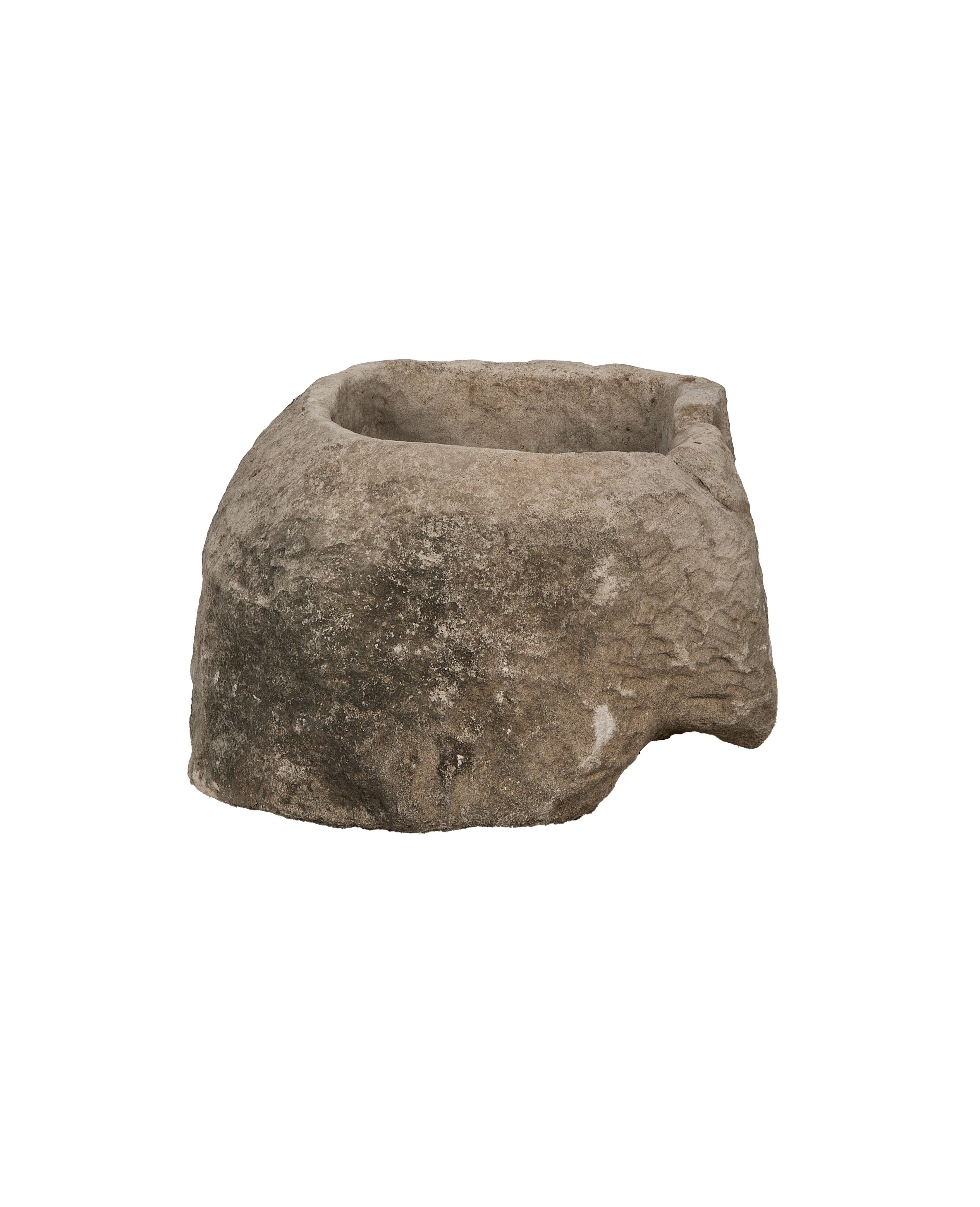 Vintage oblong limestone trough from Indonesia, weathered surface texture visible, partial side view.