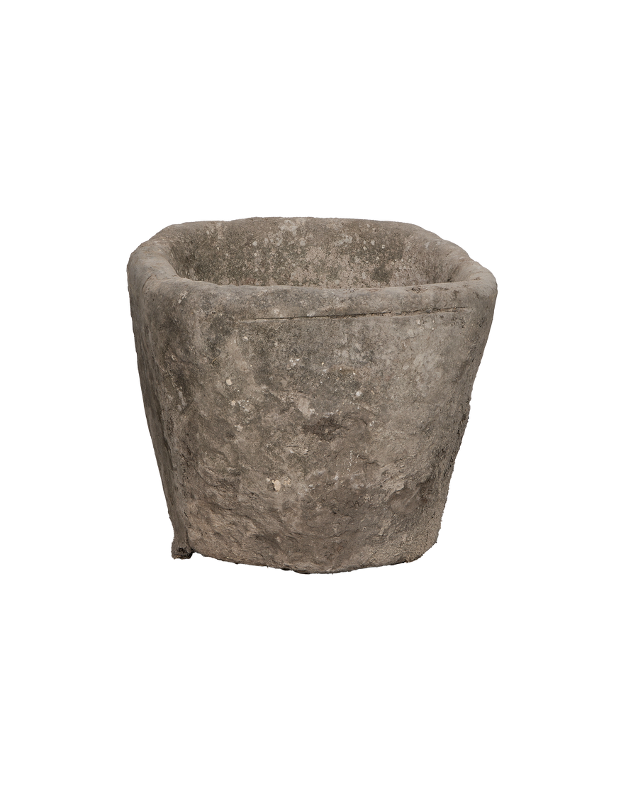 Vintage oblong limestone trough from Indonesia, showcasing weathered texture and unique organic shape.