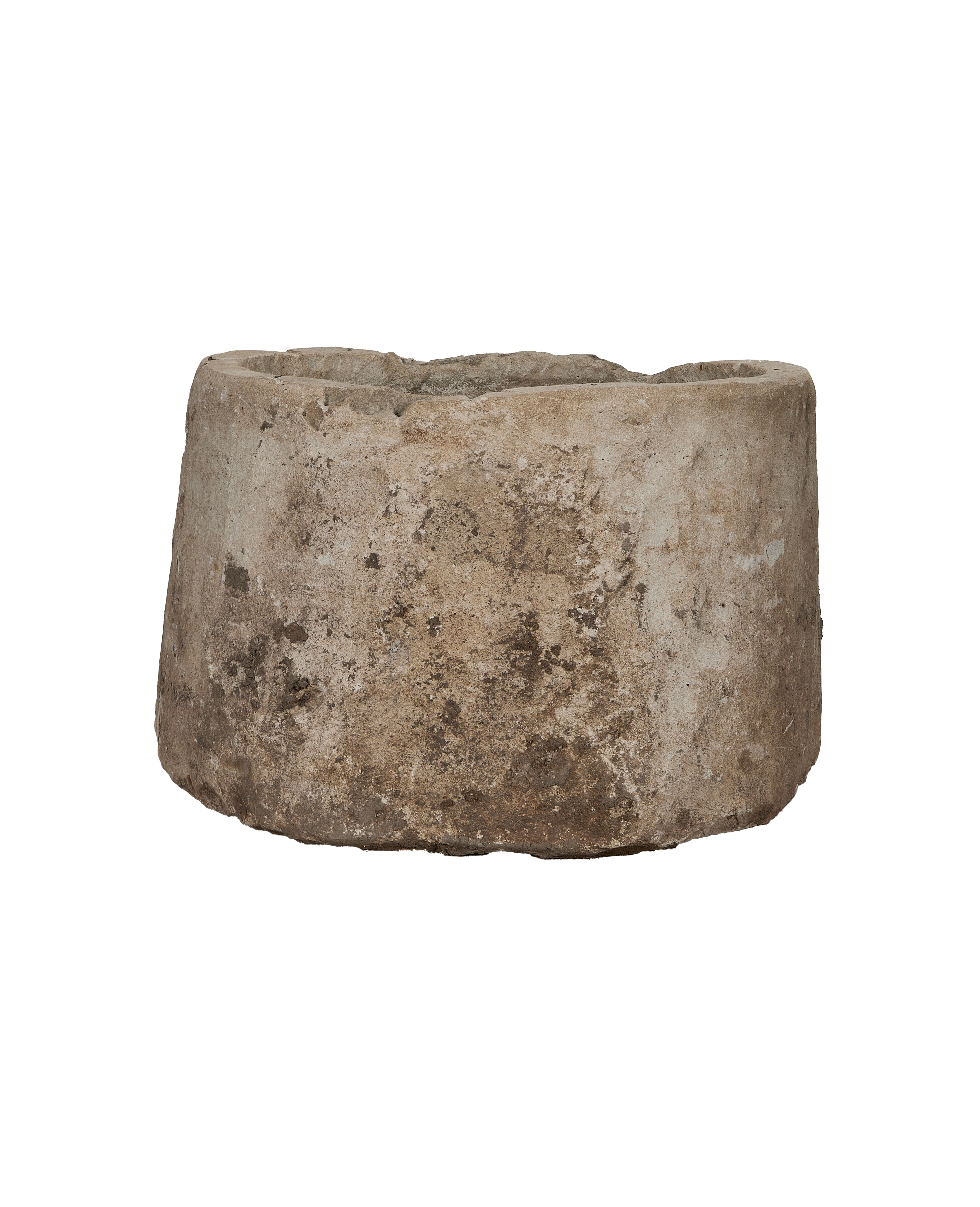 Vintage Indonesian limestone trough, showing its rough, weathered texture and rounded bottom edge.