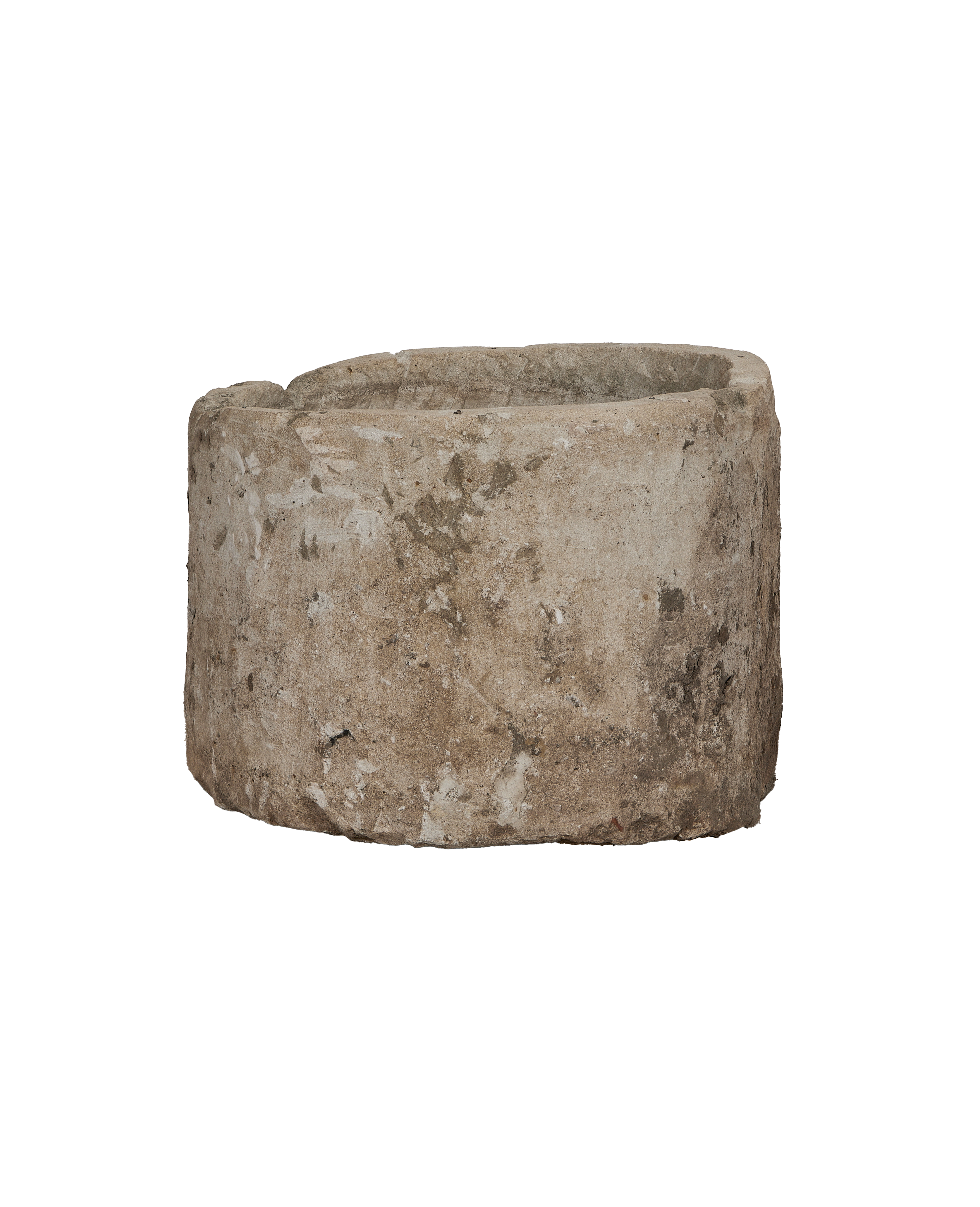 Vintage Indonesian limestone trough, OAK, showing rough weathered texture from side angle.