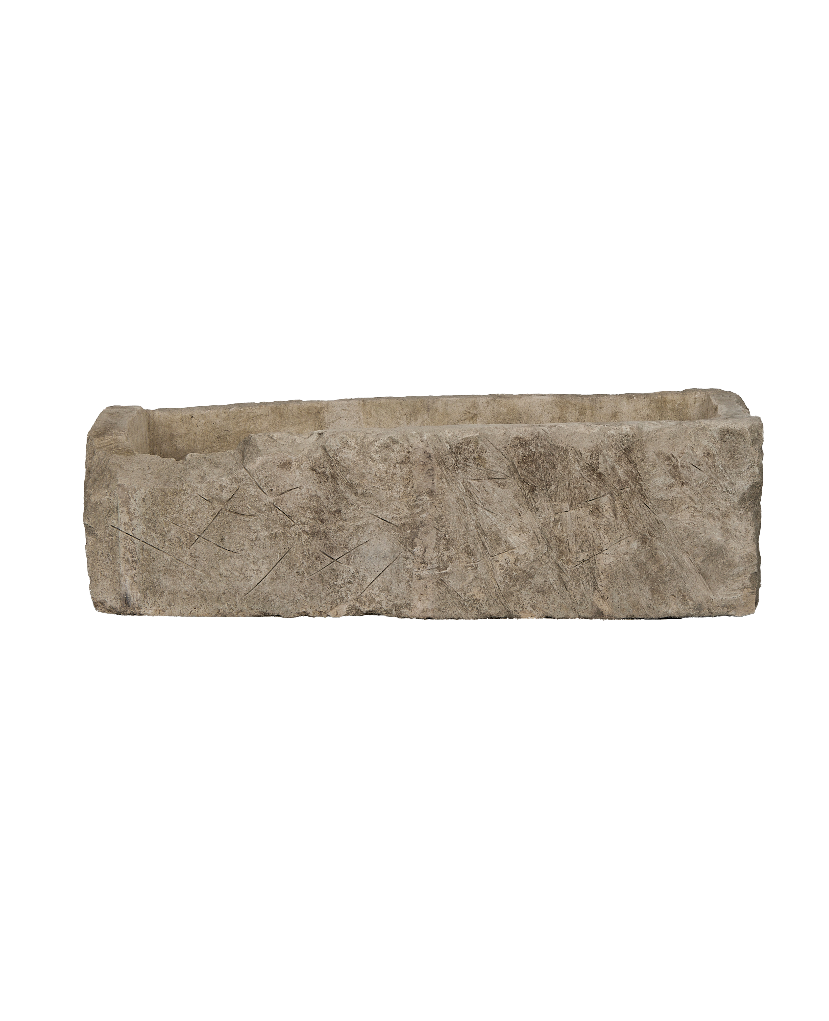 Vintage Indonesian rectangular limestone trough showing rough-hewn texture and chisel marks on its side.