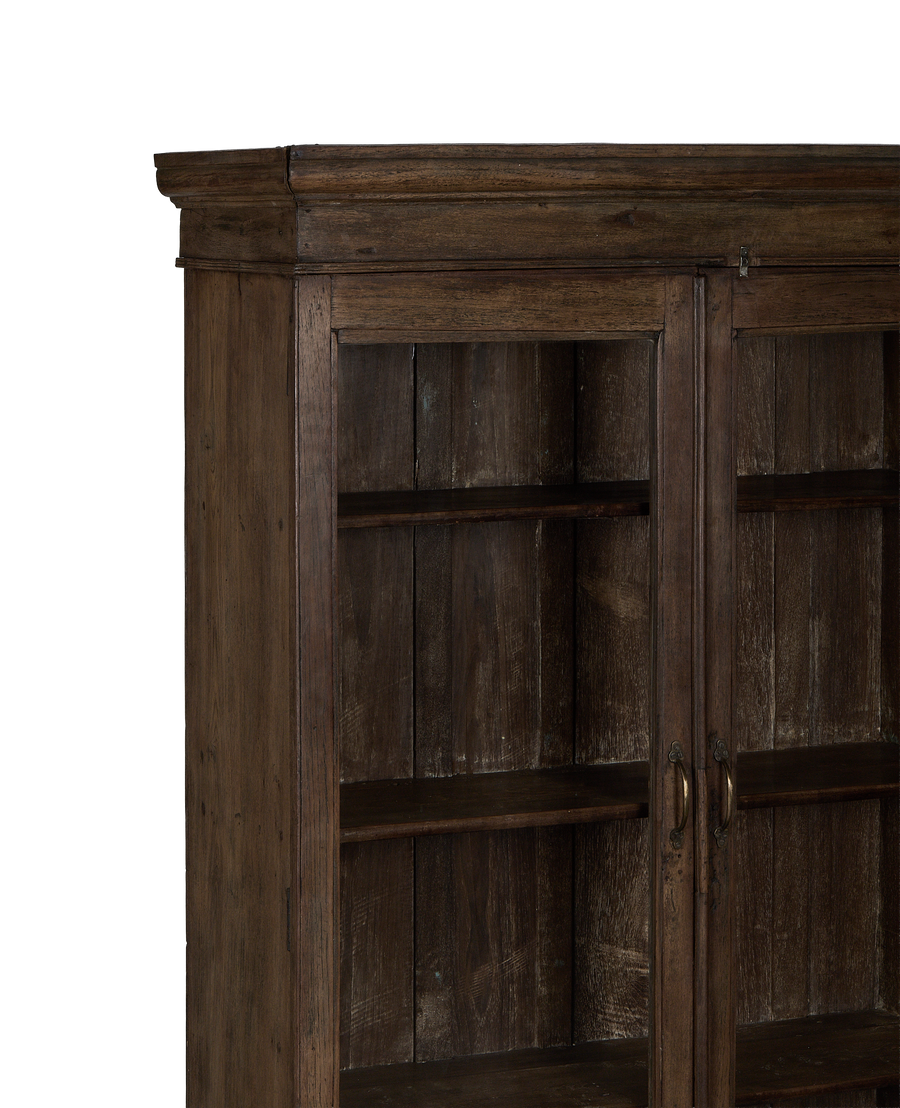 Close-up of vintage Indian oak wood cabinet's natural grain and distressed finish.