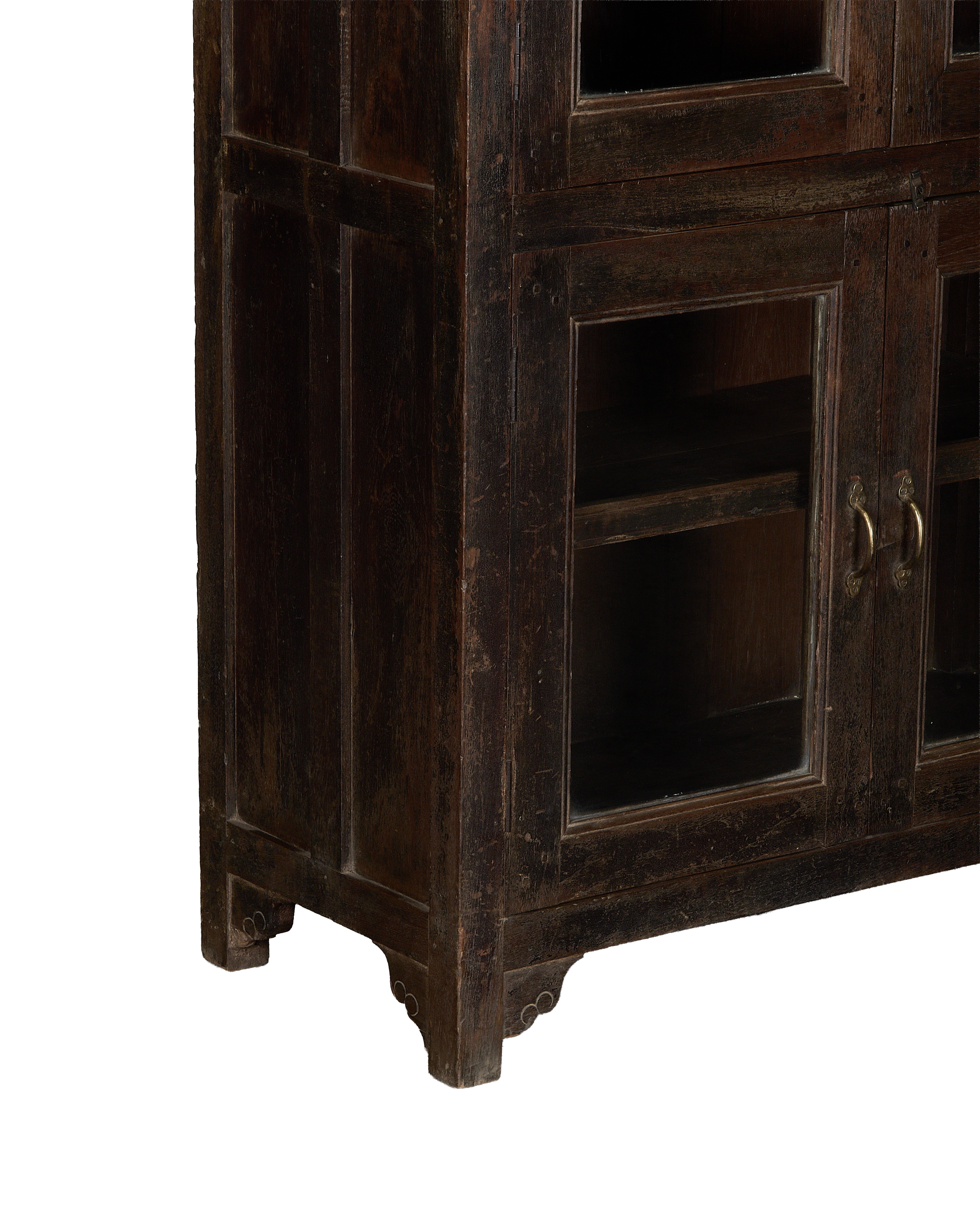 Vintage Indian natural oak cabinet, distressed dark wood, glass doors, and brass ring handles.