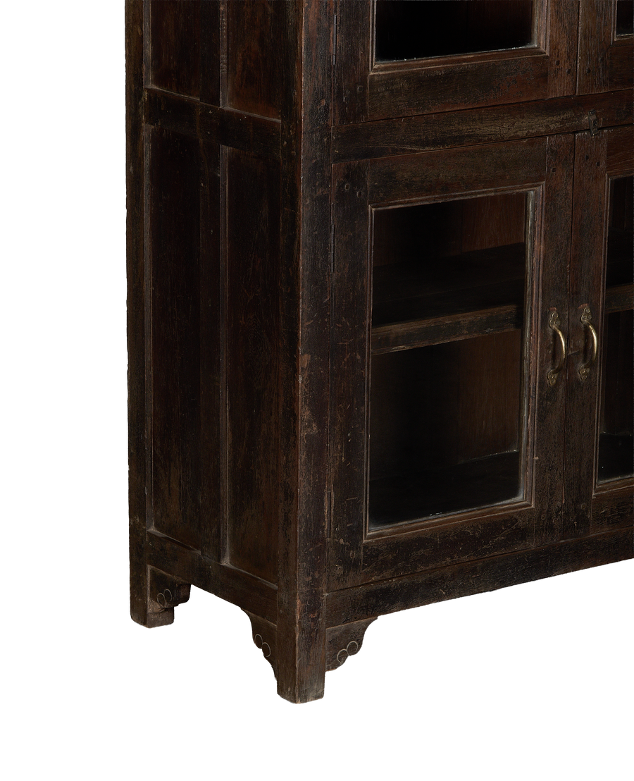 Vintage Indian natural oak cabinet, distressed dark wood, glass doors, and brass ring handles.